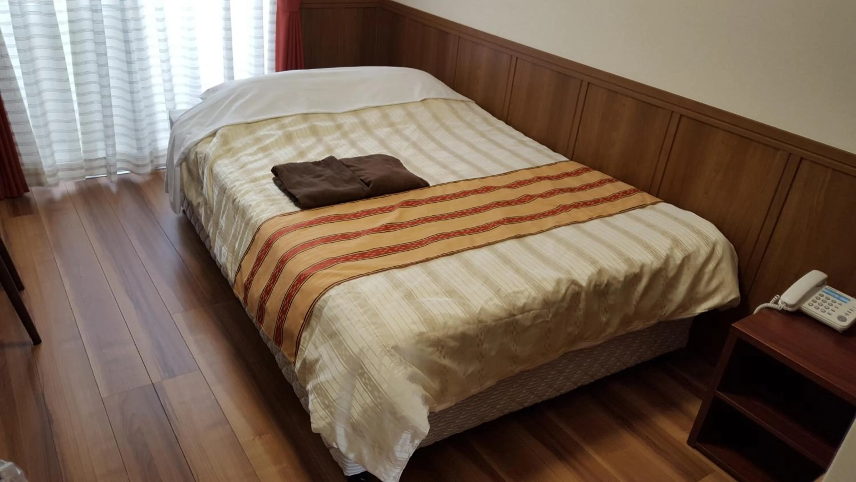 Bed in Hotel Peacely In Miyakojima Nexus