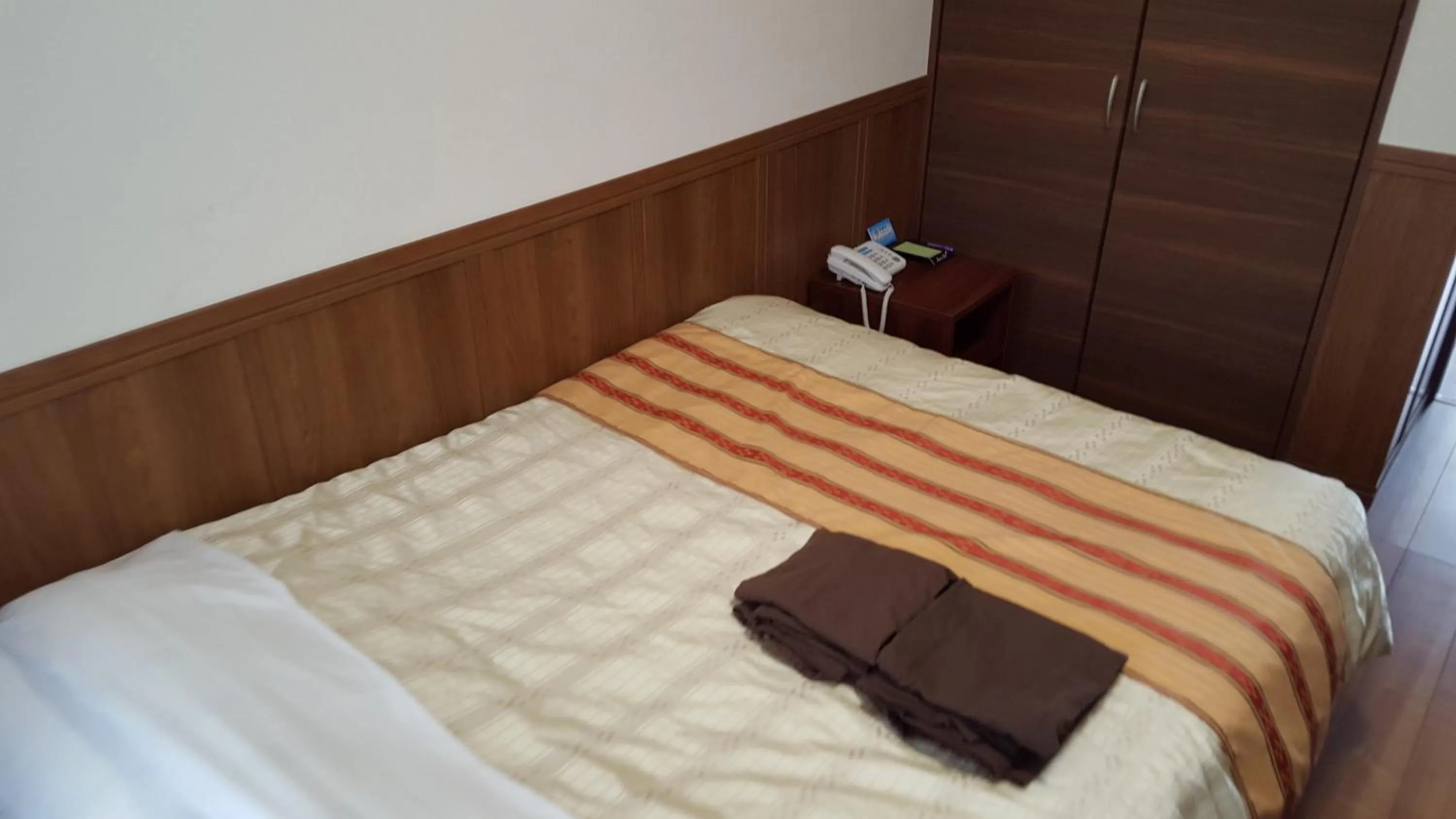 Bed in Hotel Peacely In Miyakojima Nexus