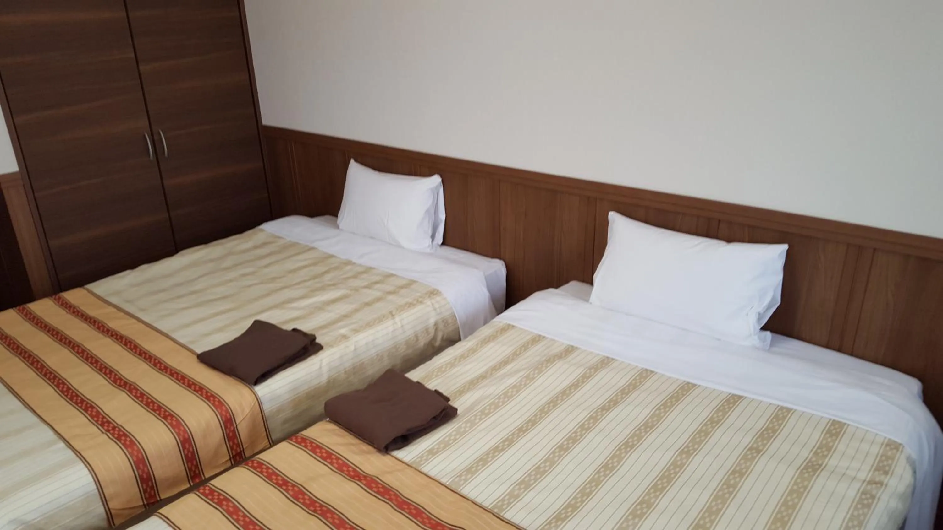 Bed in Hotel Peacely In Miyakojima Nexus