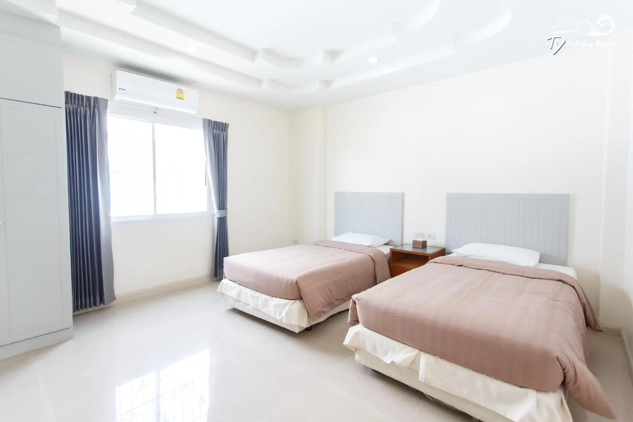 Bed in TY Holiday Resort