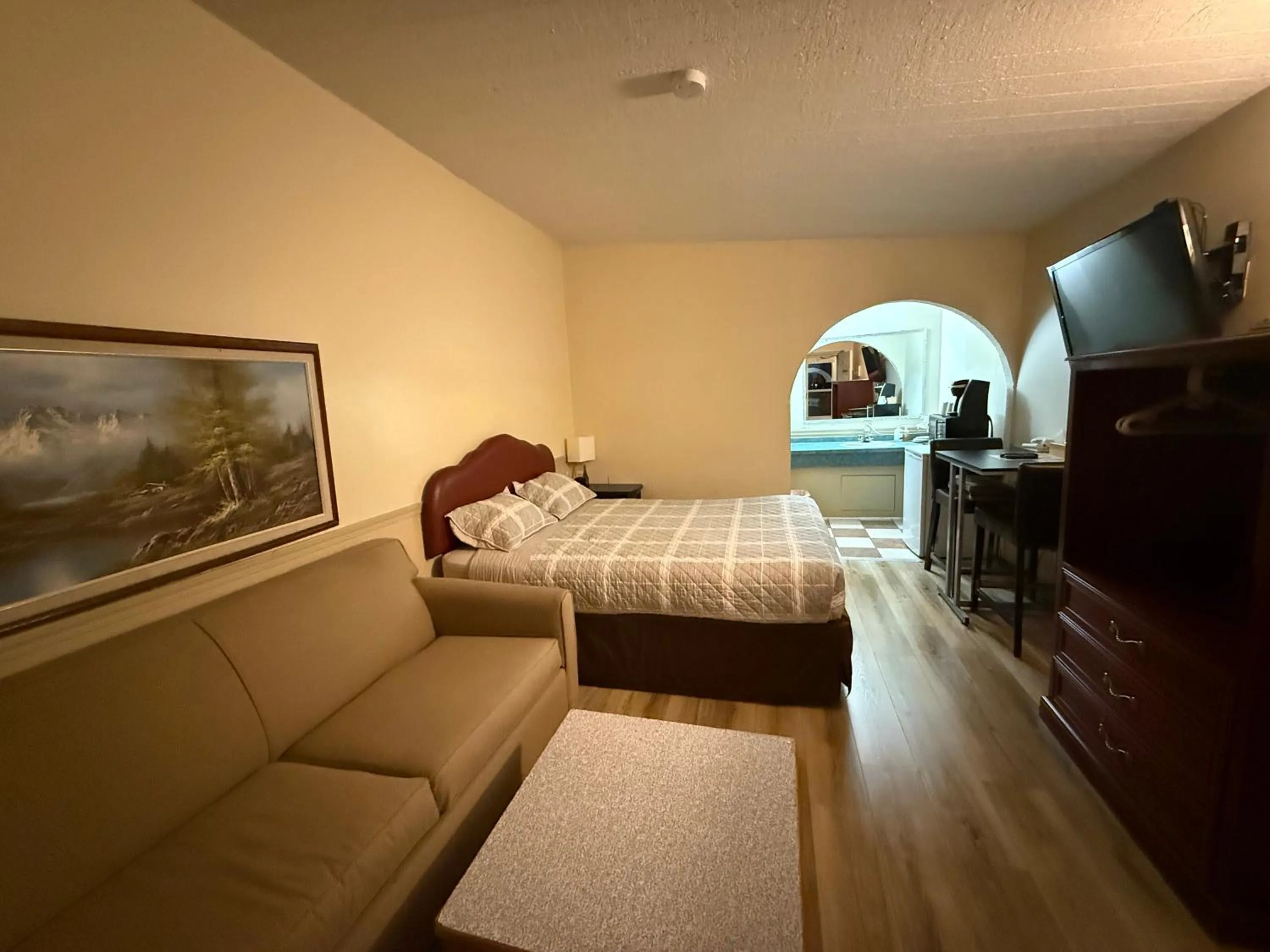 Bed in Centre Suite Inns Motel