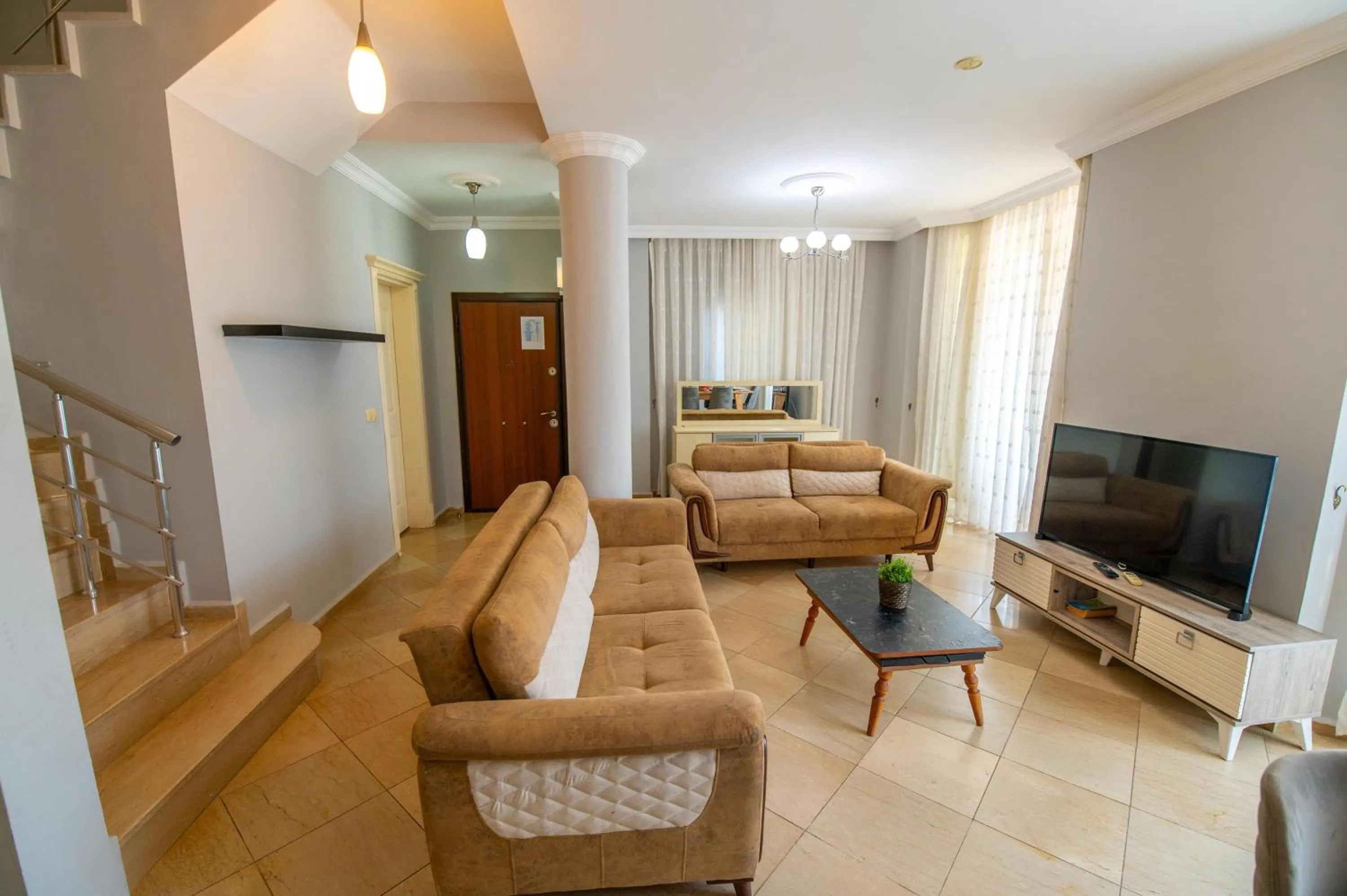 Communal lounge/ TV room in Sunset Beach Club Aqualettings Oyster 5