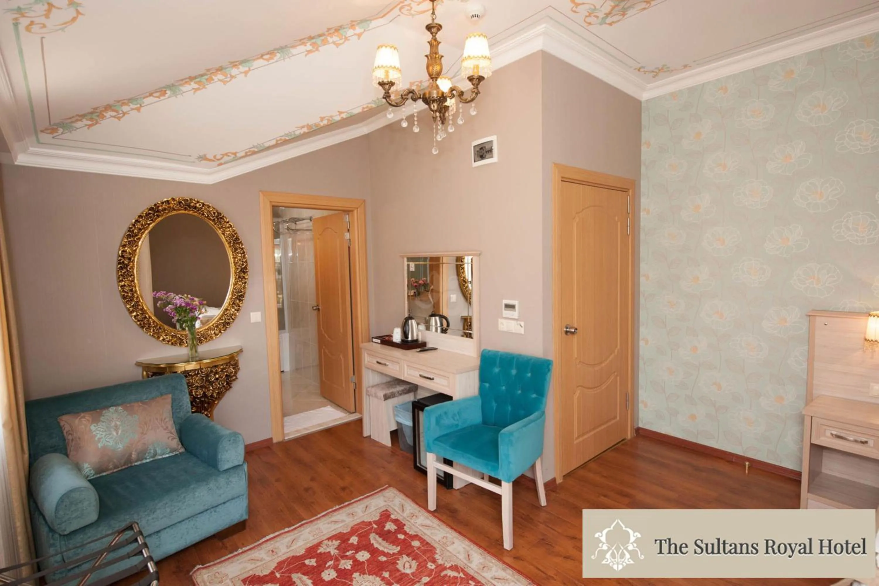 Living room, Bed in Sultans Royal Hotel