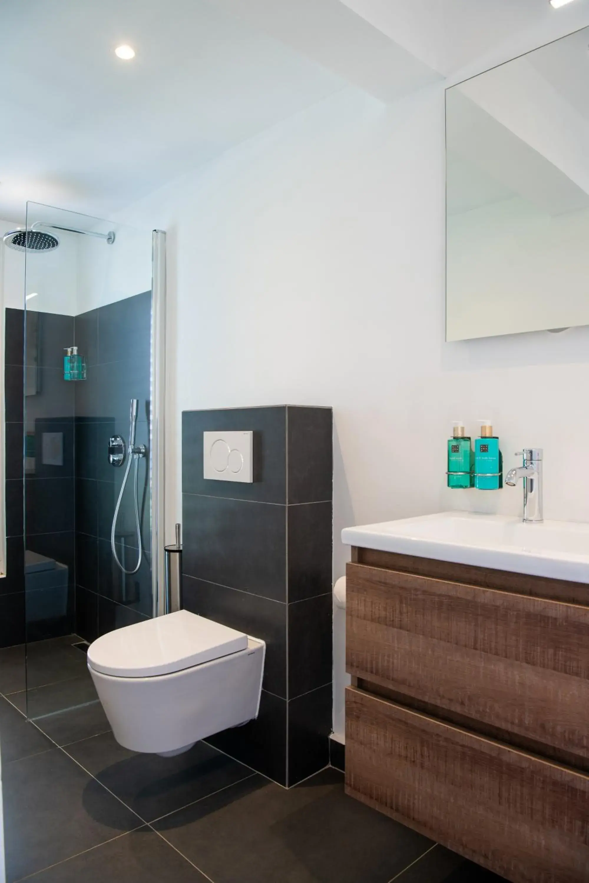 Bathroom in Scuba Lodge & Suites Bathroom in Scuba Lodge & Suites