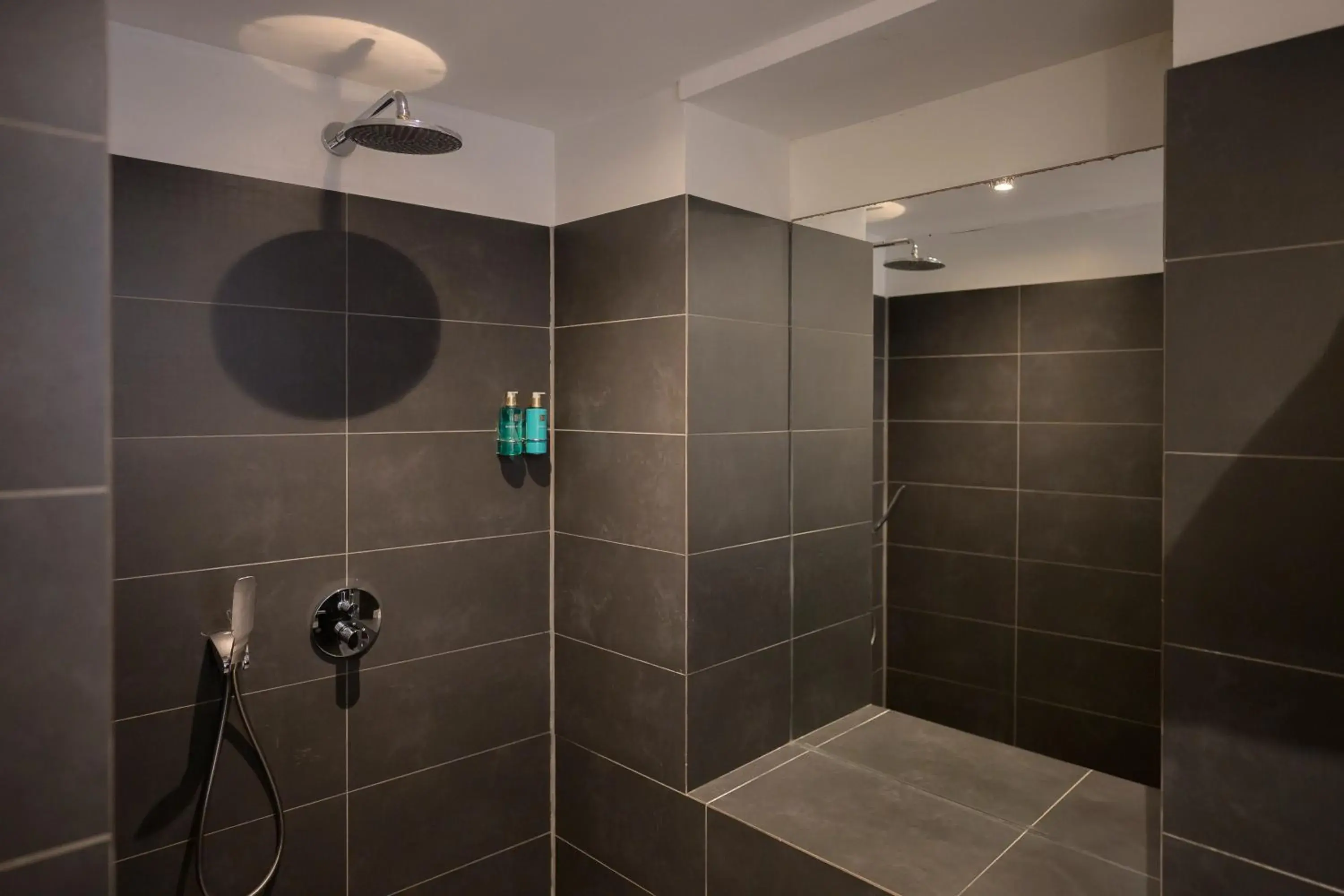 Bathroom in Scuba Lodge & Suites Bathroom in Scuba Lodge & Suites