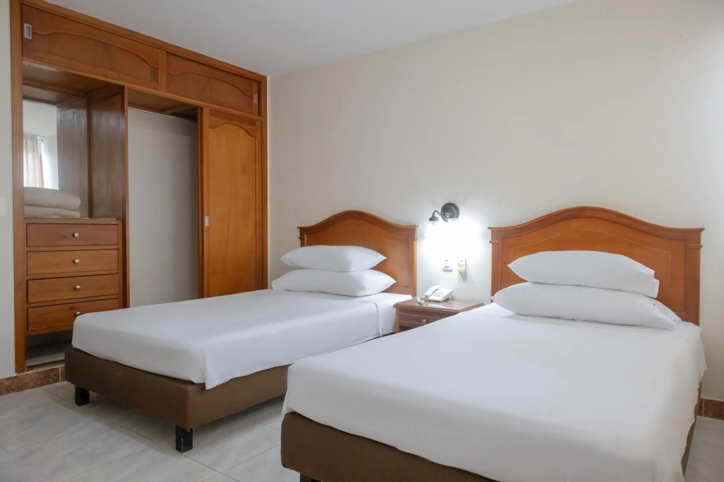 Bed in Hotel Faranda Bolivar Cucuta, a member of Radisson Individuals