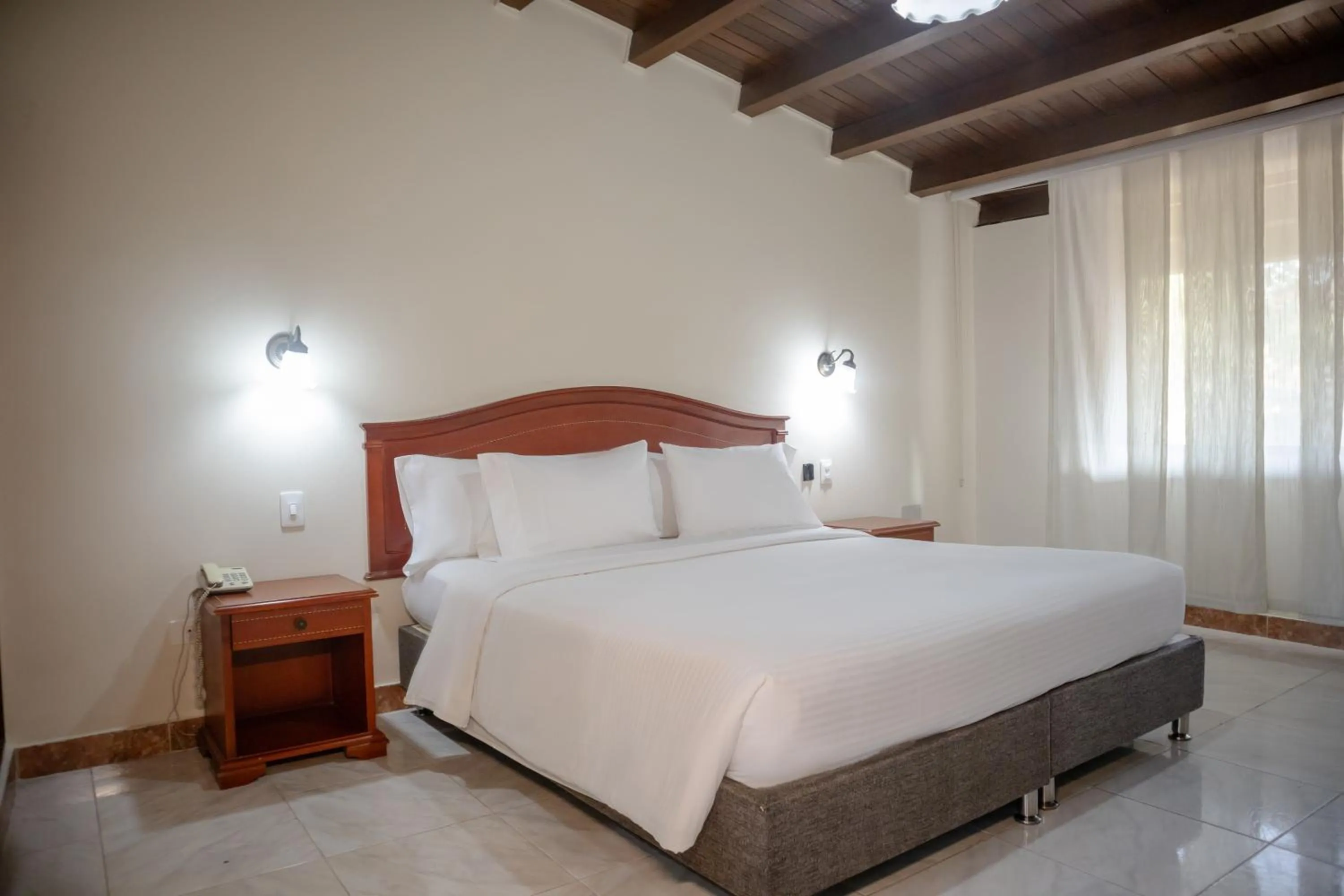 Bed in Hotel Faranda Bolivar Cucuta, a member of Radisson Individuals