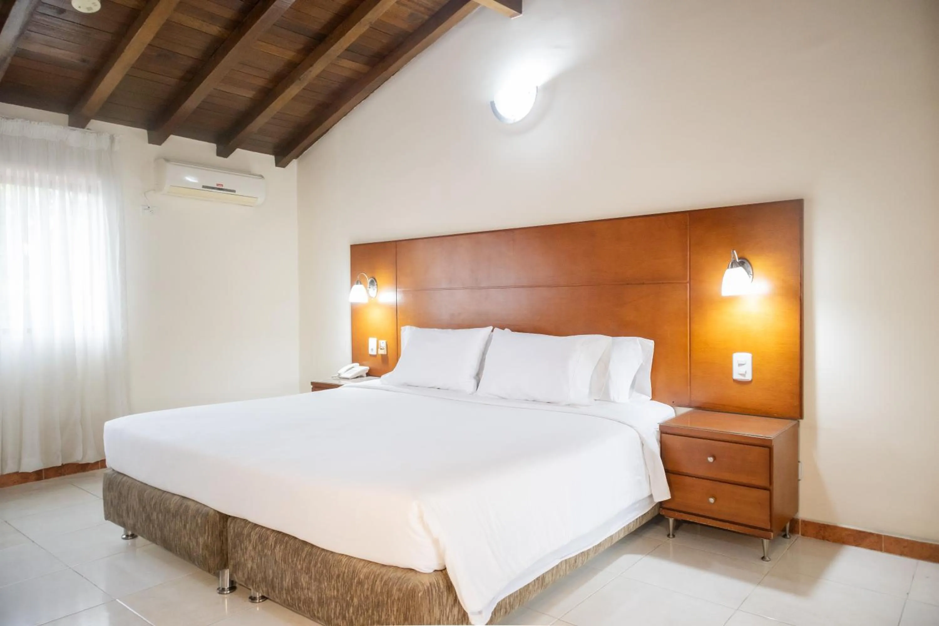 Bed in Hotel Faranda Bolivar Cucuta, a member of Radisson Individuals
