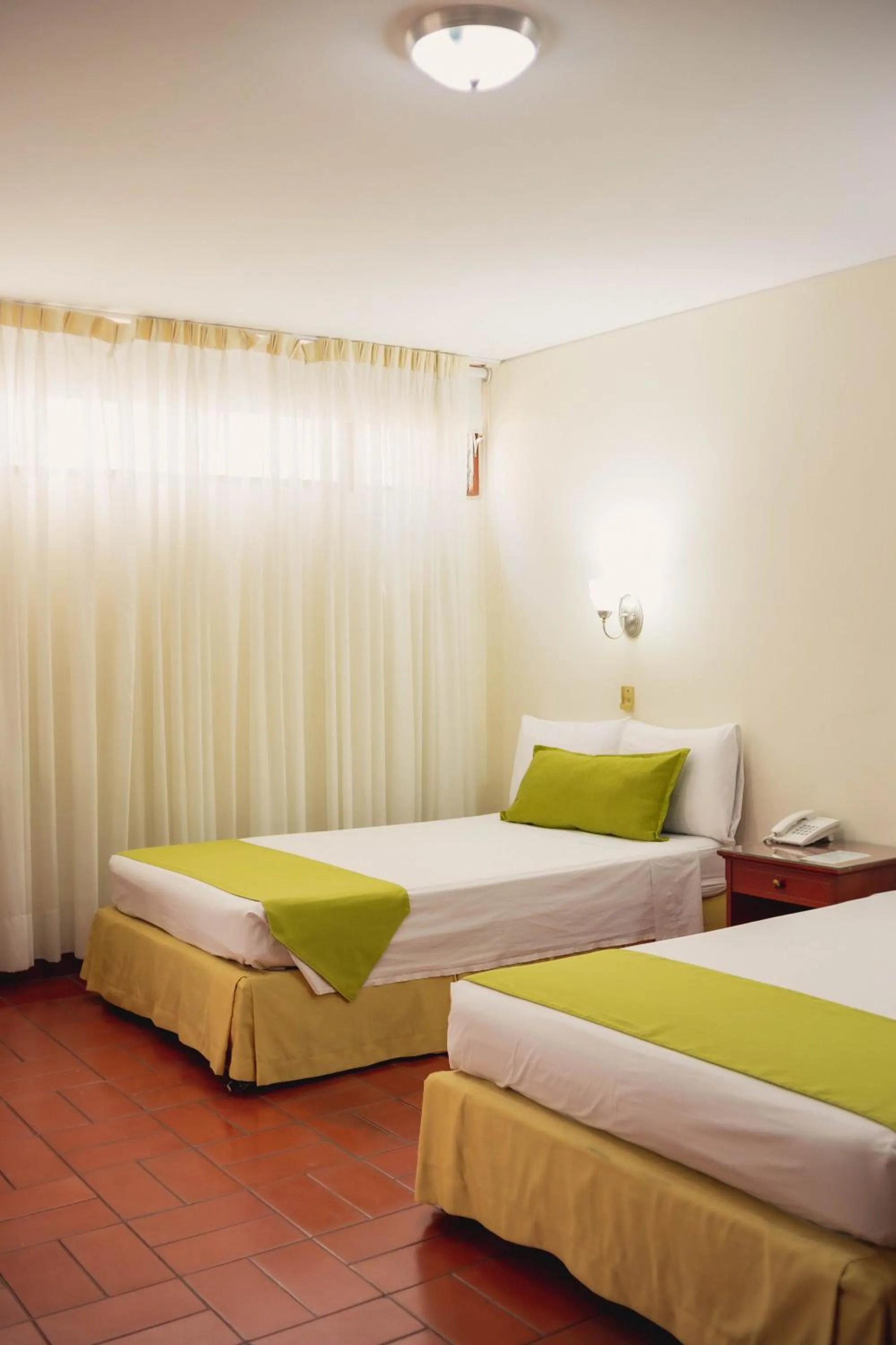 Bed in Hotel Faranda Bolivar Cucuta, a member of Radisson Individuals