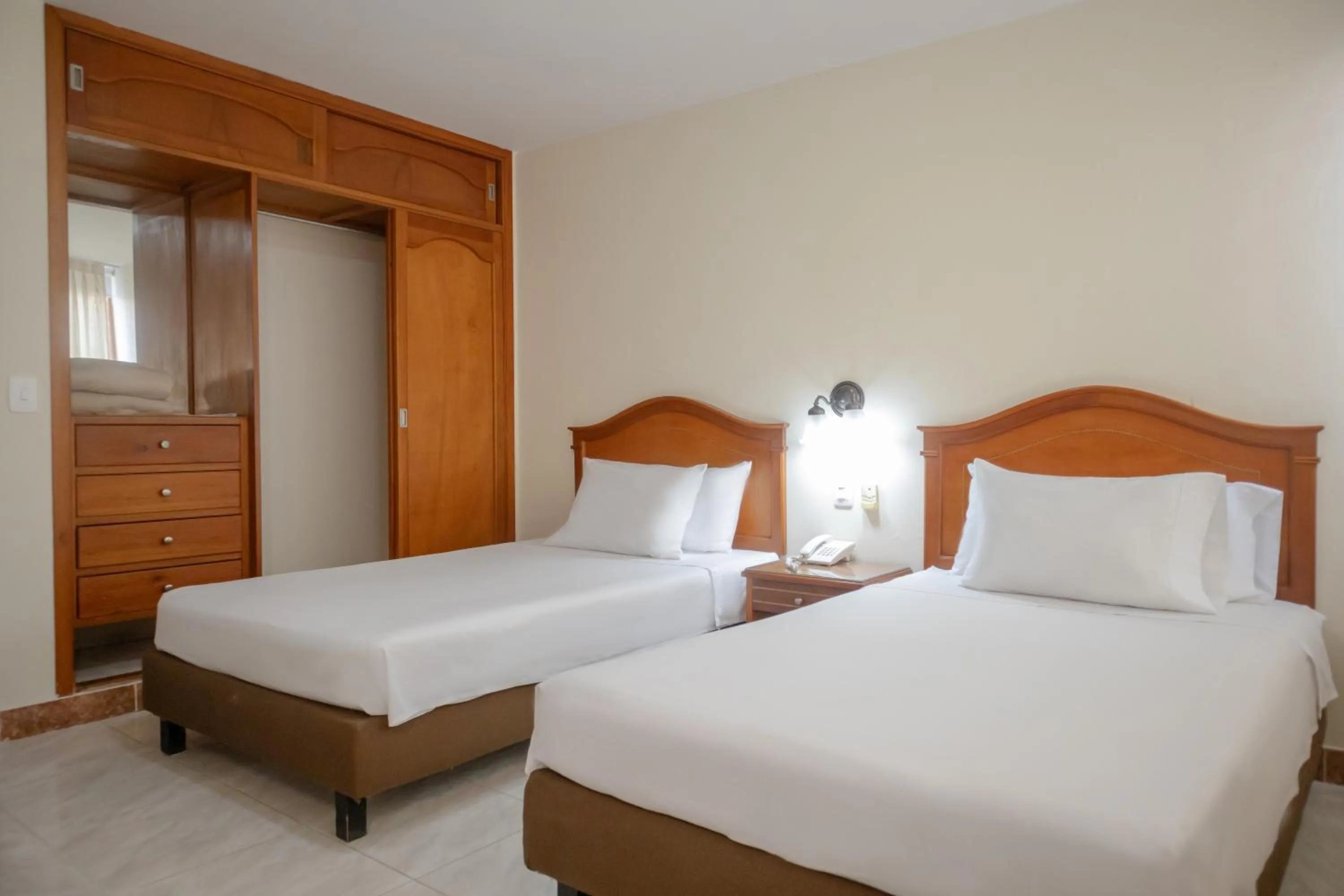 Bed in Hotel Faranda Bolivar Cucuta, a member of Radisson Individuals