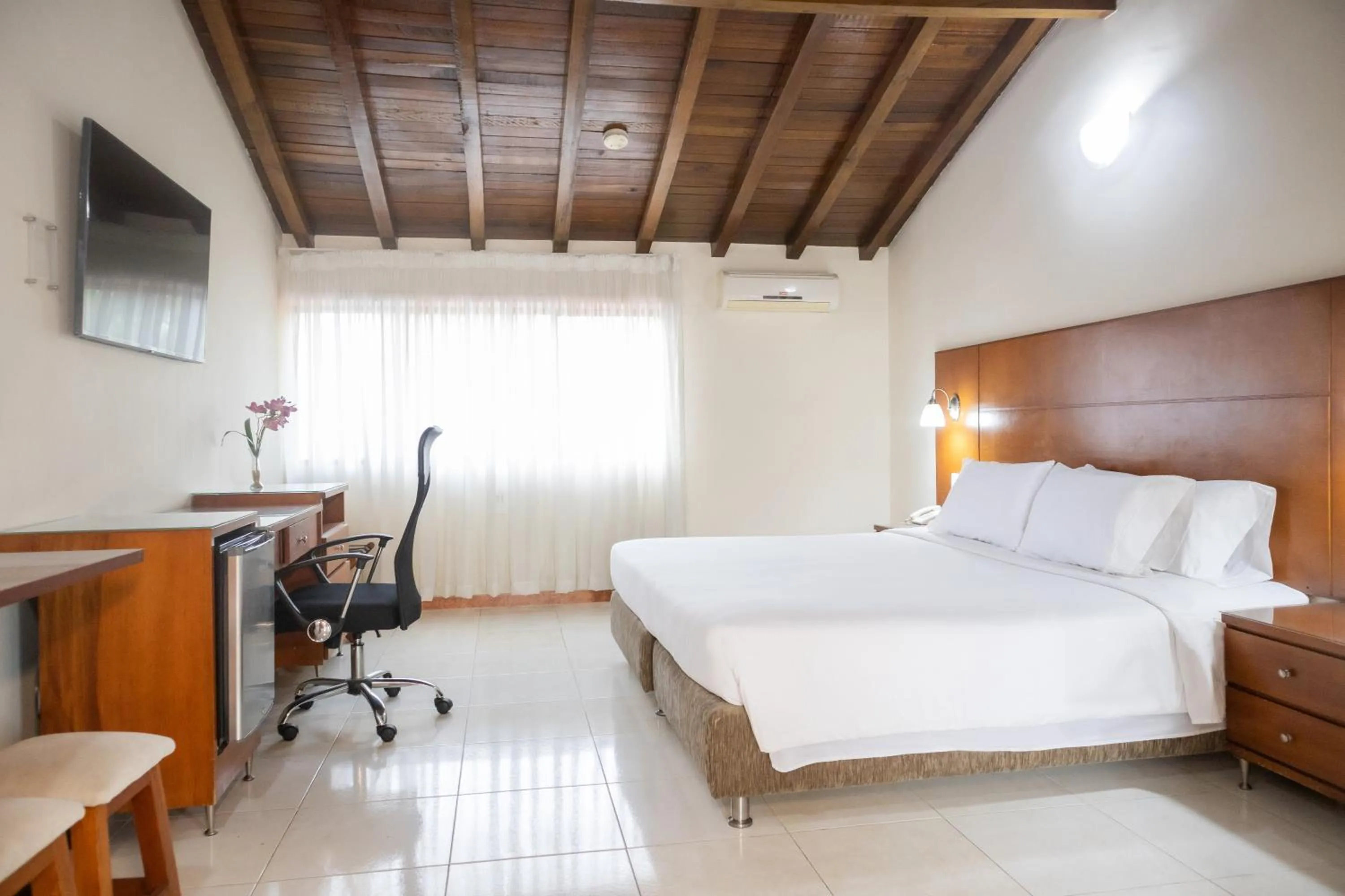 Bed in Hotel Faranda Bolivar Cucuta, a member of Radisson Individuals
