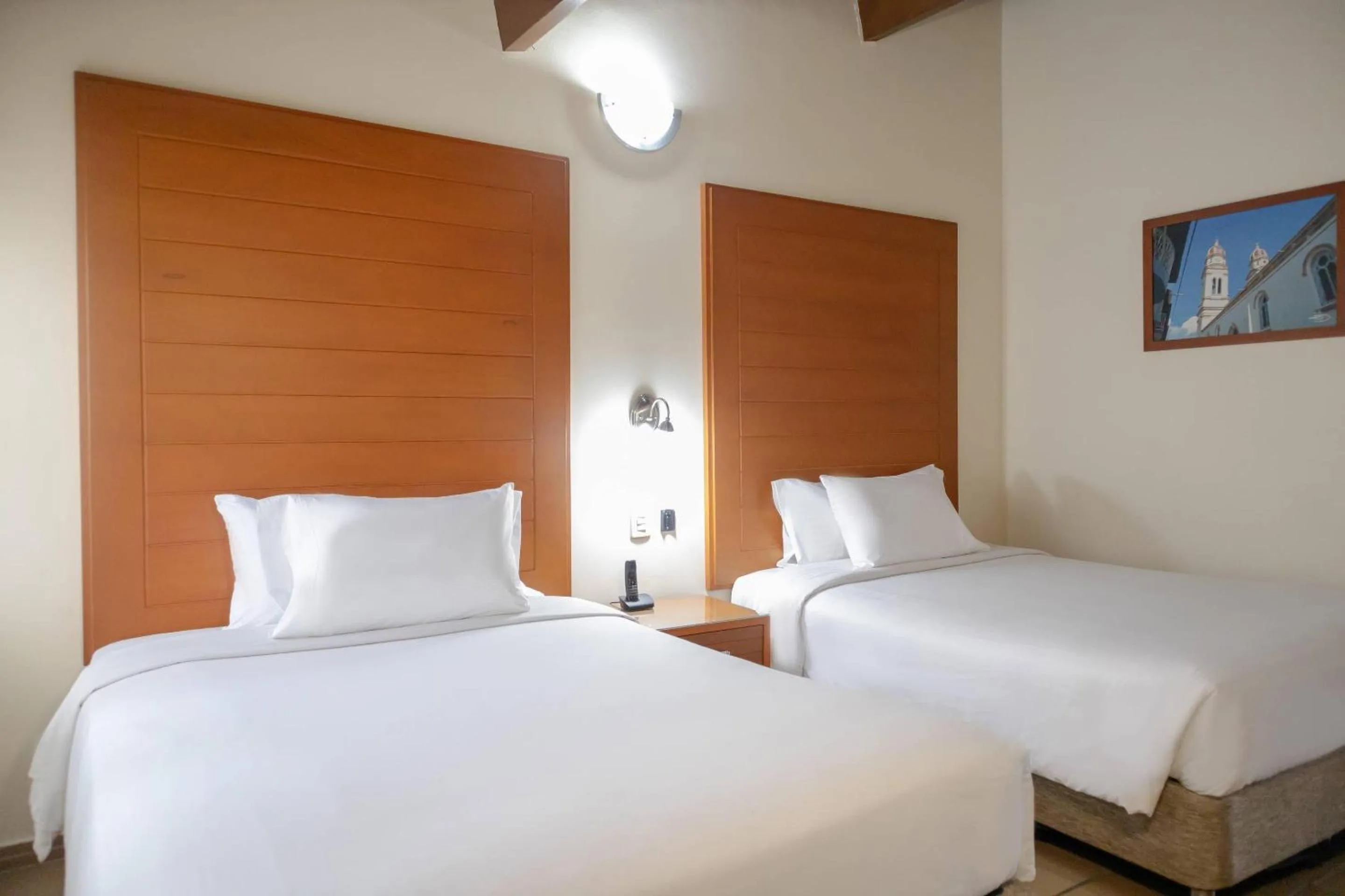 Bedroom, Bed in Hotel Faranda Bolivar Cucuta, a member of Radisson Individuals