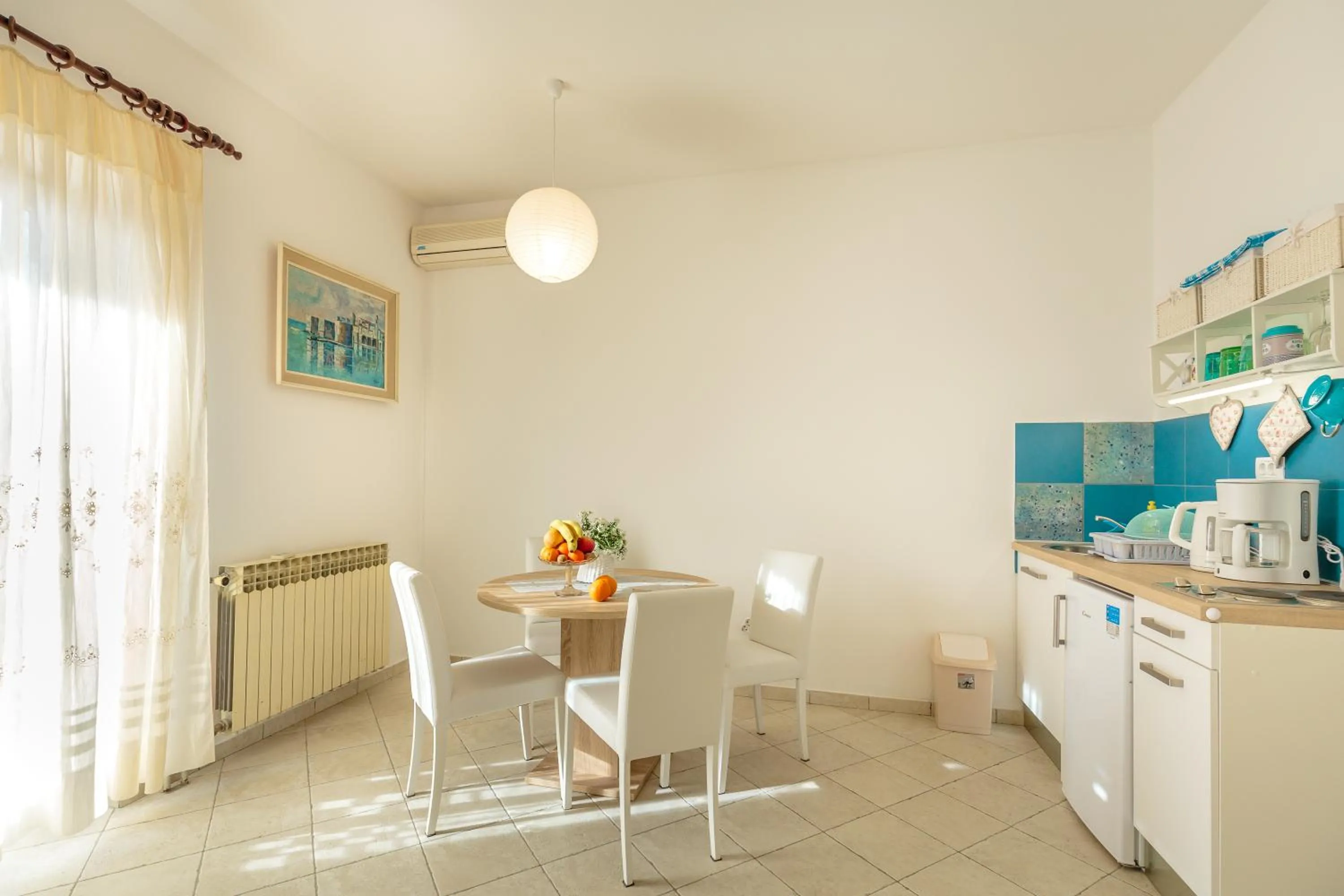 Kitchen or kitchenette in Music Apartment