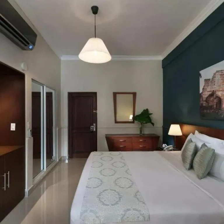 Photo of the whole room, Bed in Hodelpa Caribe Colonial