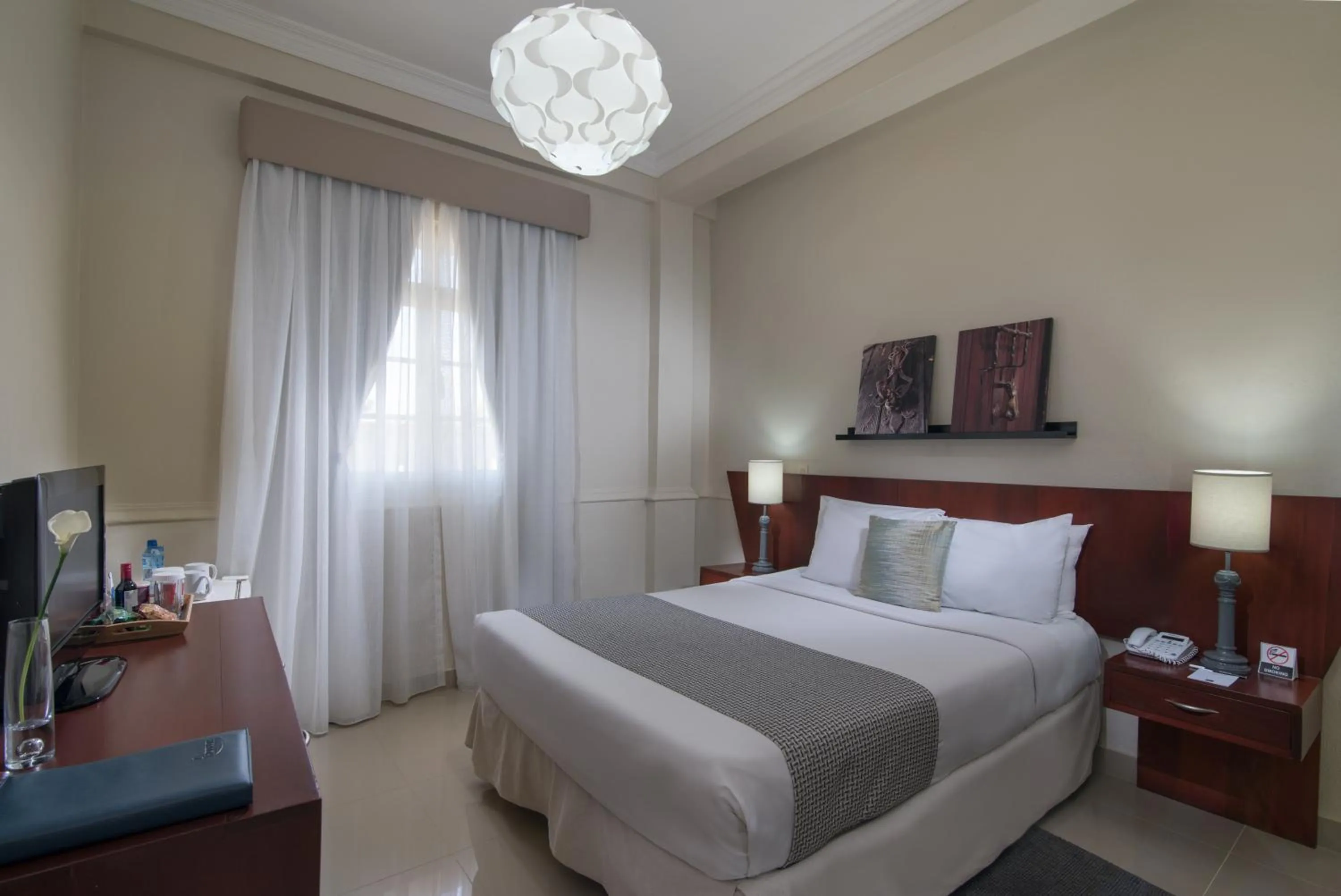 Bed in Hodelpa Caribe Colonial