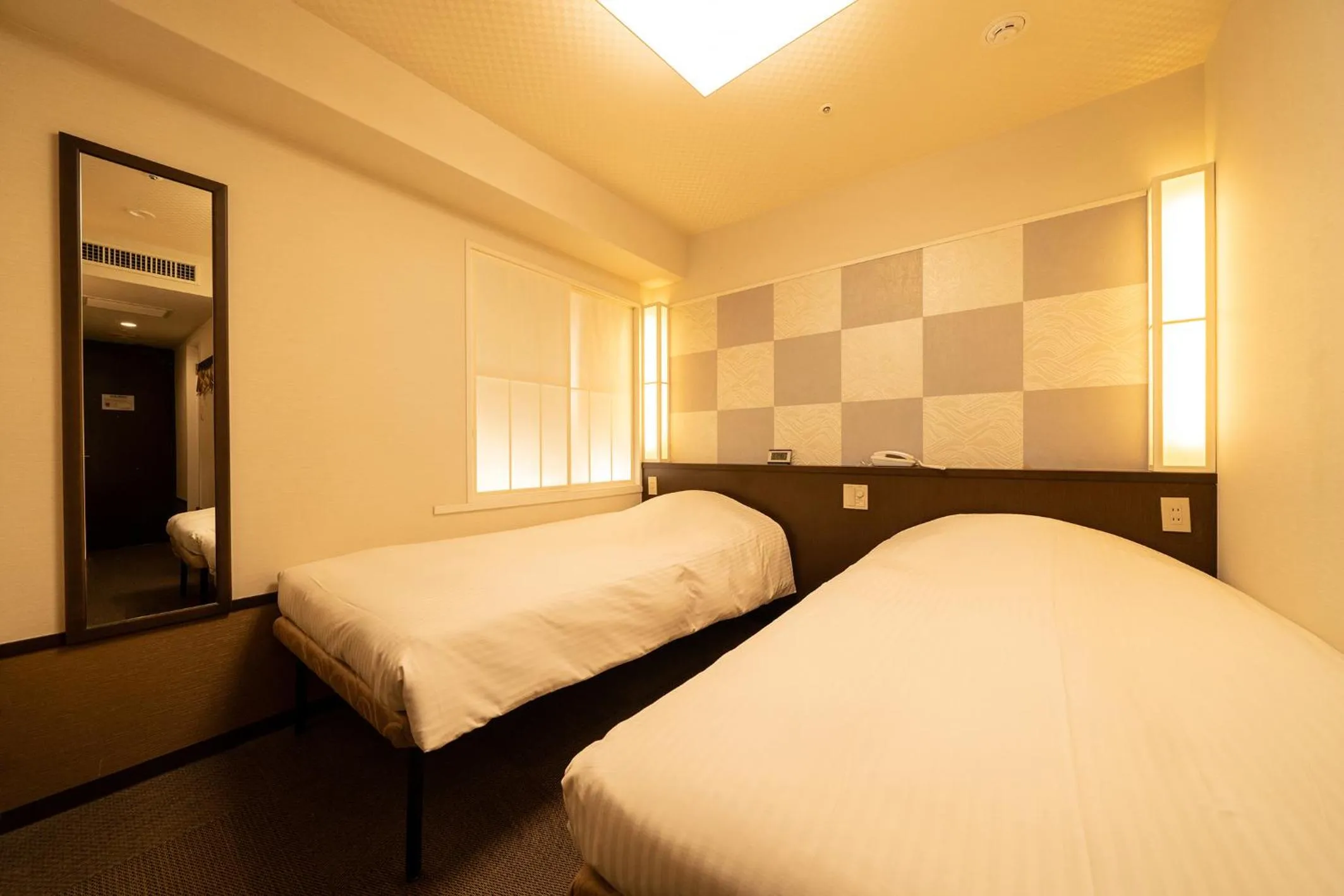Photo of the whole room, Bed in Hotel Sunlite Shinjuku