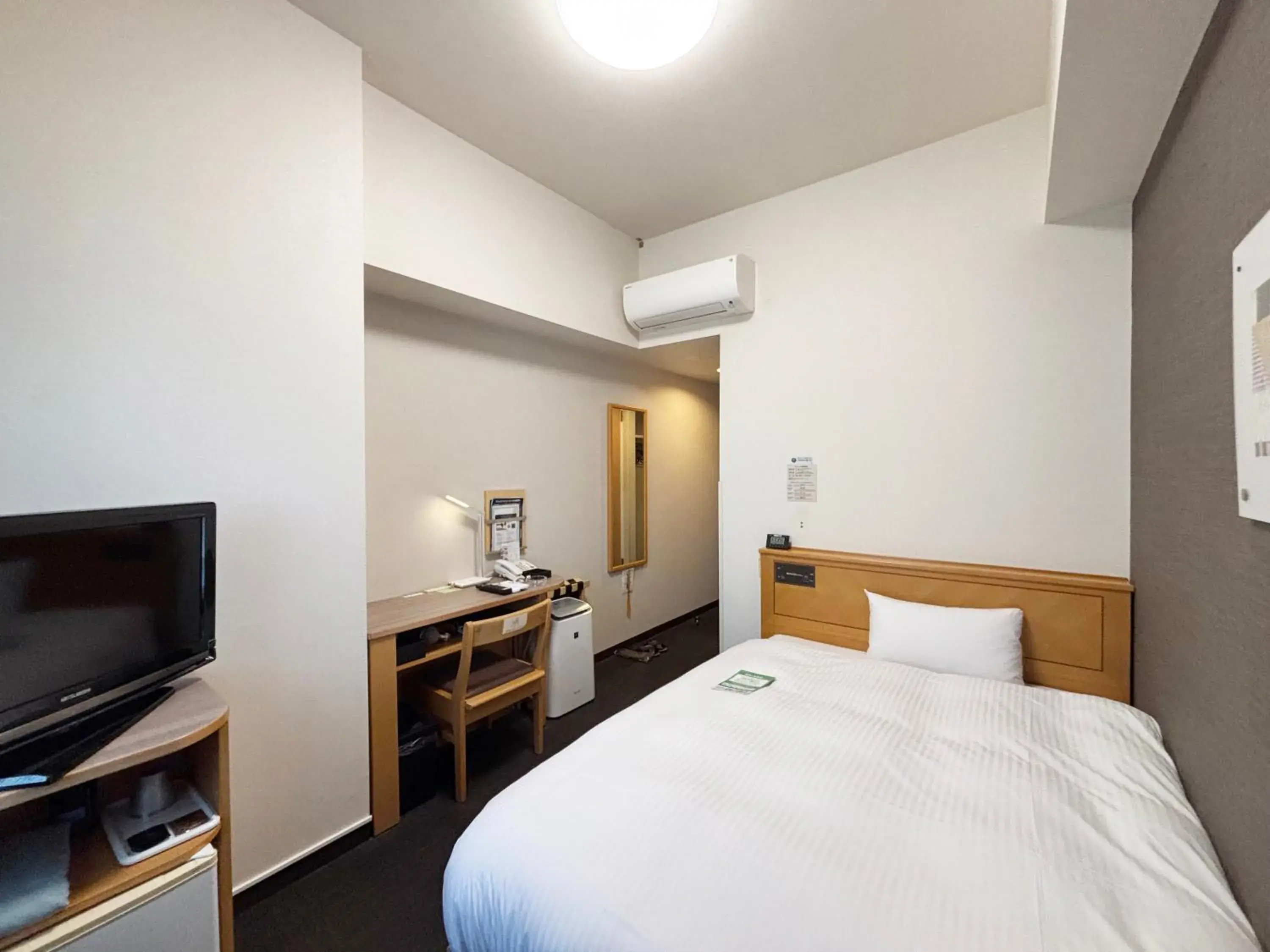 Photo of the whole room, Bed in Hotel Route-Inn Nahatomariko Photo of the whole room, Bed in Hotel Route-Inn Nahatomariko