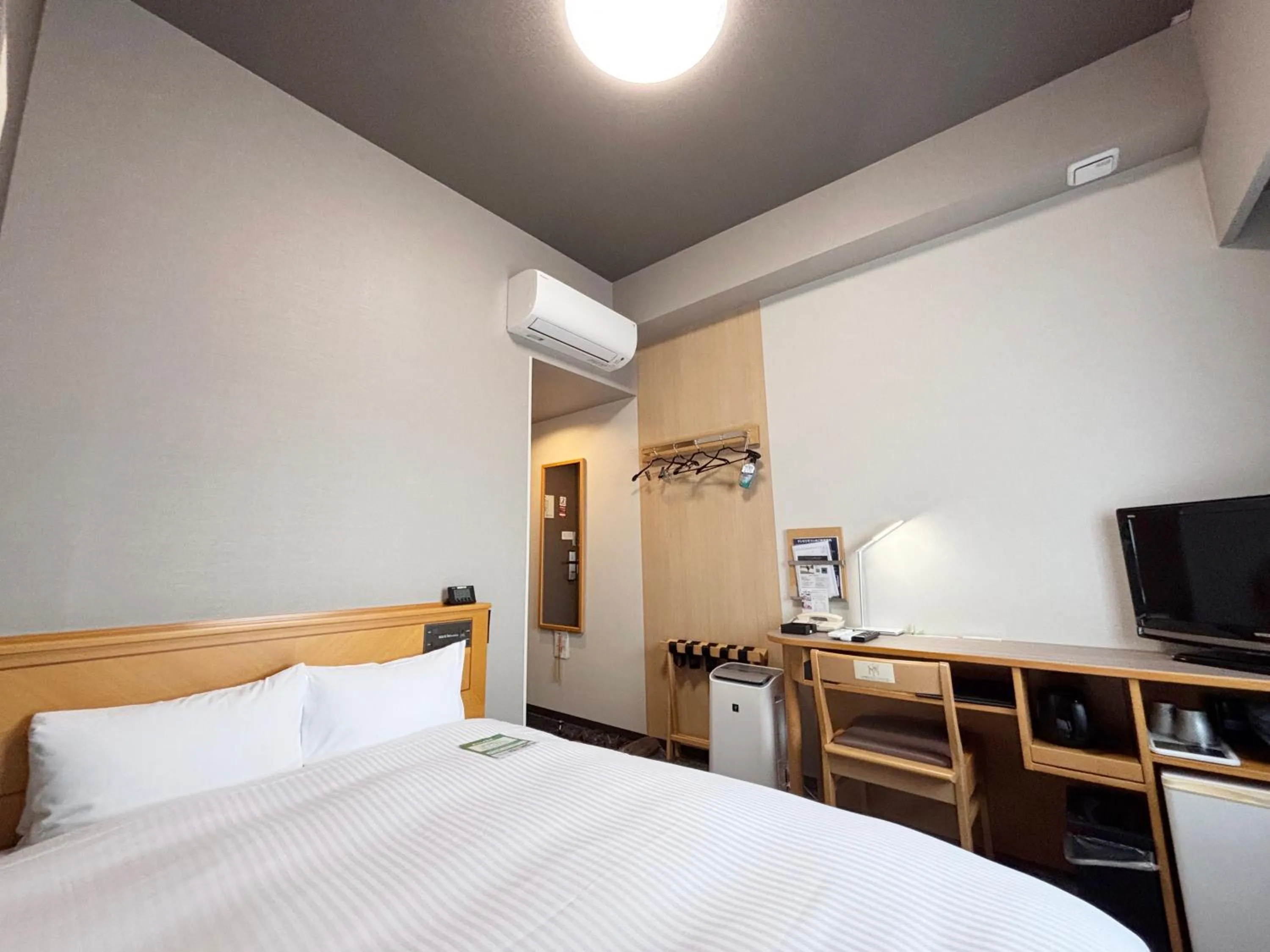 Photo of the whole room, Bed in Hotel Route-Inn Nahatomariko