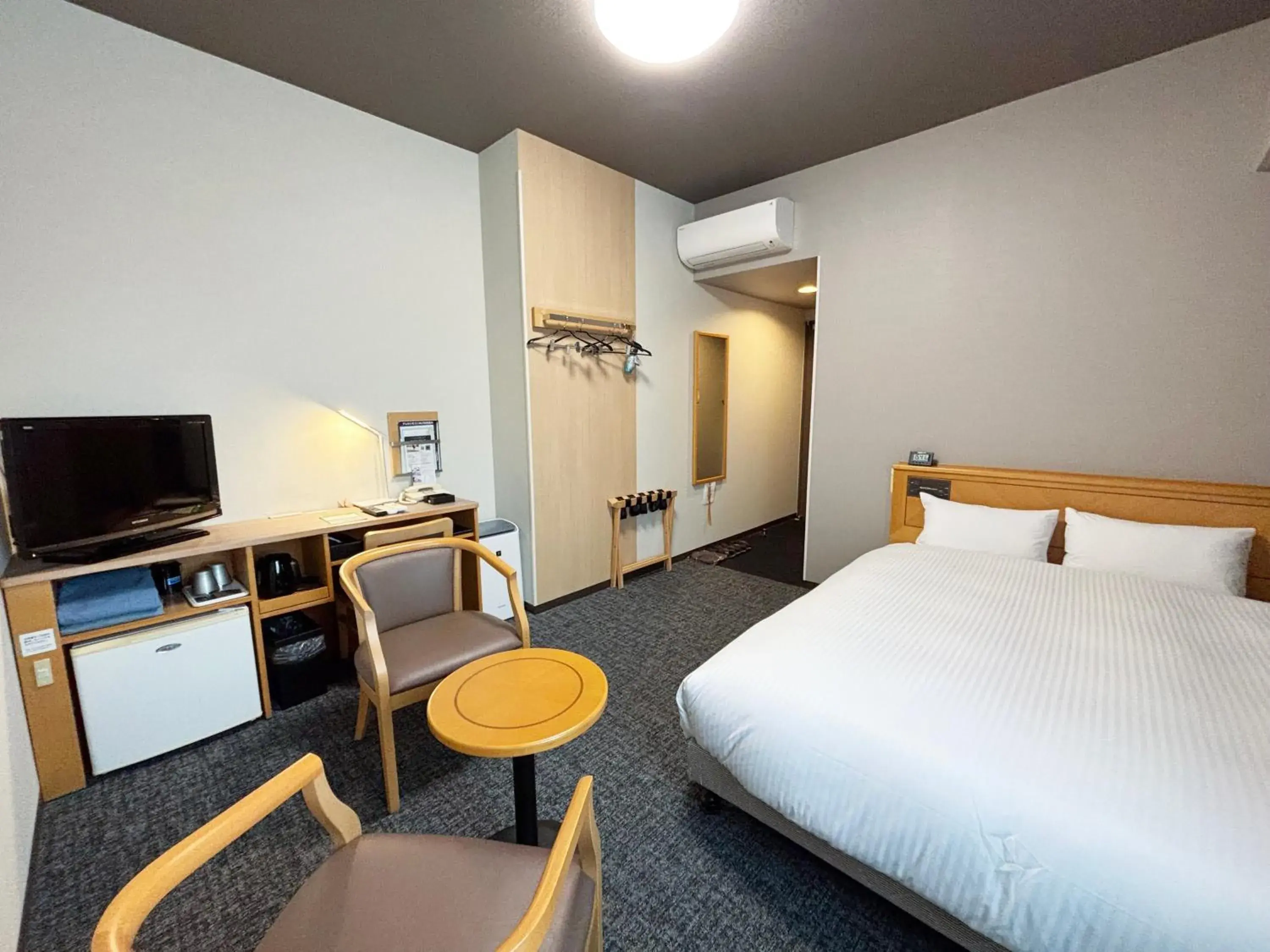 Photo of the whole room, Bed in Hotel Route-Inn Nahatomariko Photo of the whole room, Bed in Hotel Route-Inn Nahatomariko