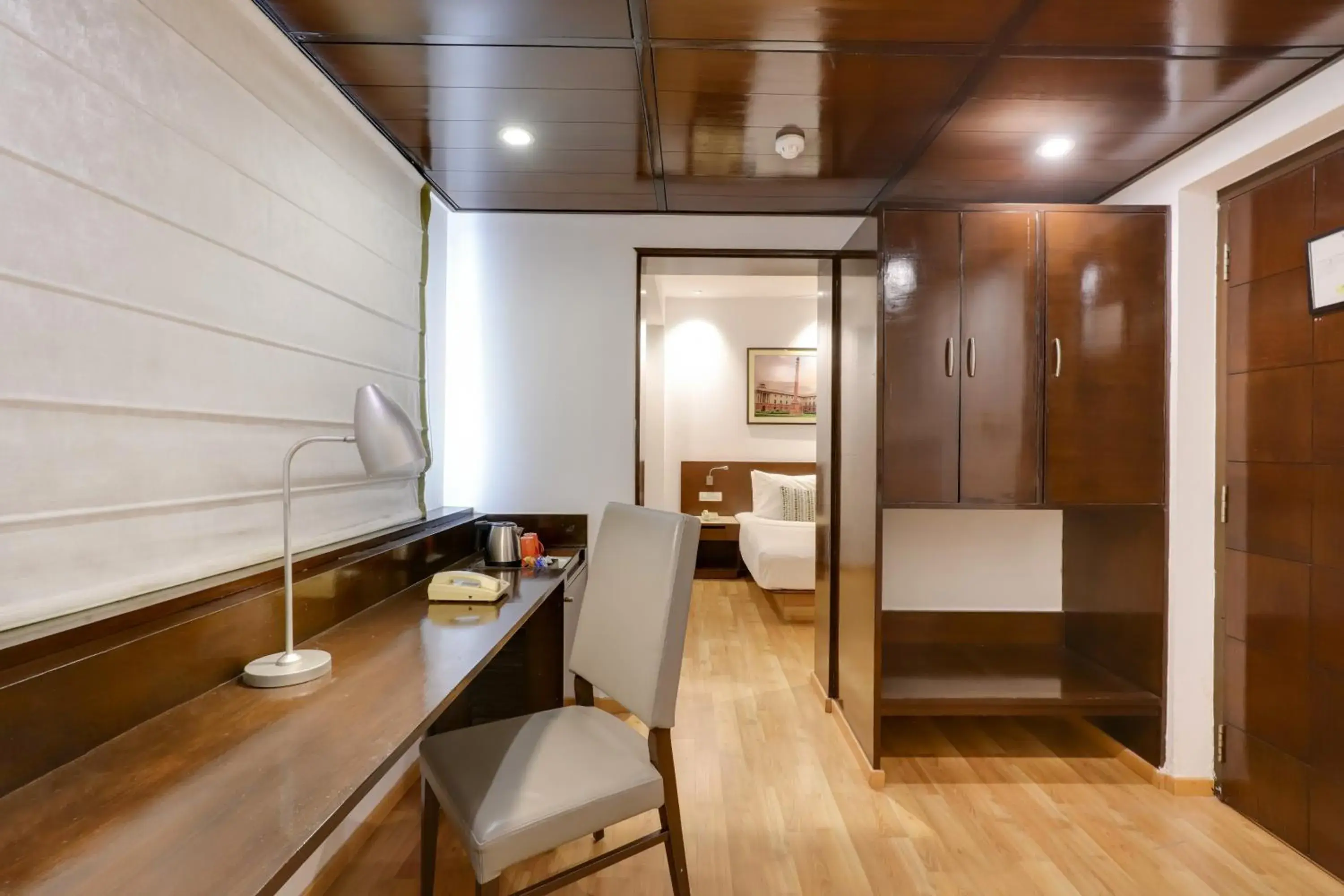 Seating area, Bed in Lemon Tree Premier 1, Gurugram Seating area, Bed in Lemon Tree Premier 1, Gurugram