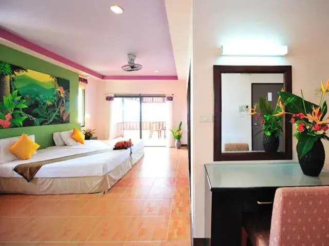 Bed in Koh Ngai Cliff Beach Resort Bed in Koh Ngai Cliff Beach Resort