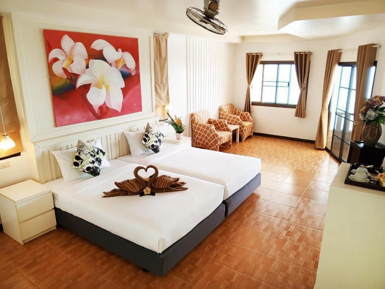 Bed in Koh Ngai Cliff Beach Resort