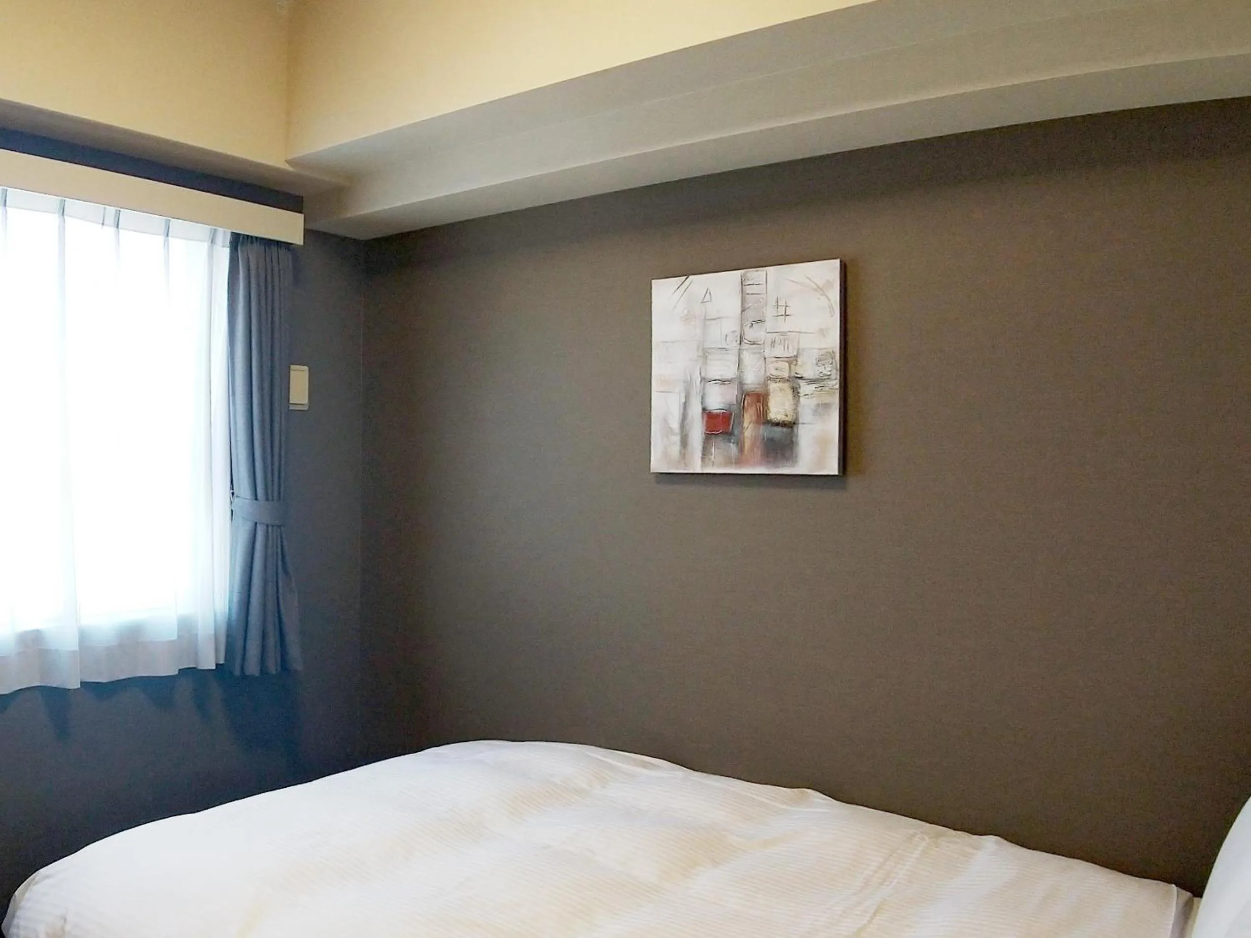 Photo of the whole room, Bed in Hotel Route-Inn Niigata Kencho-minami