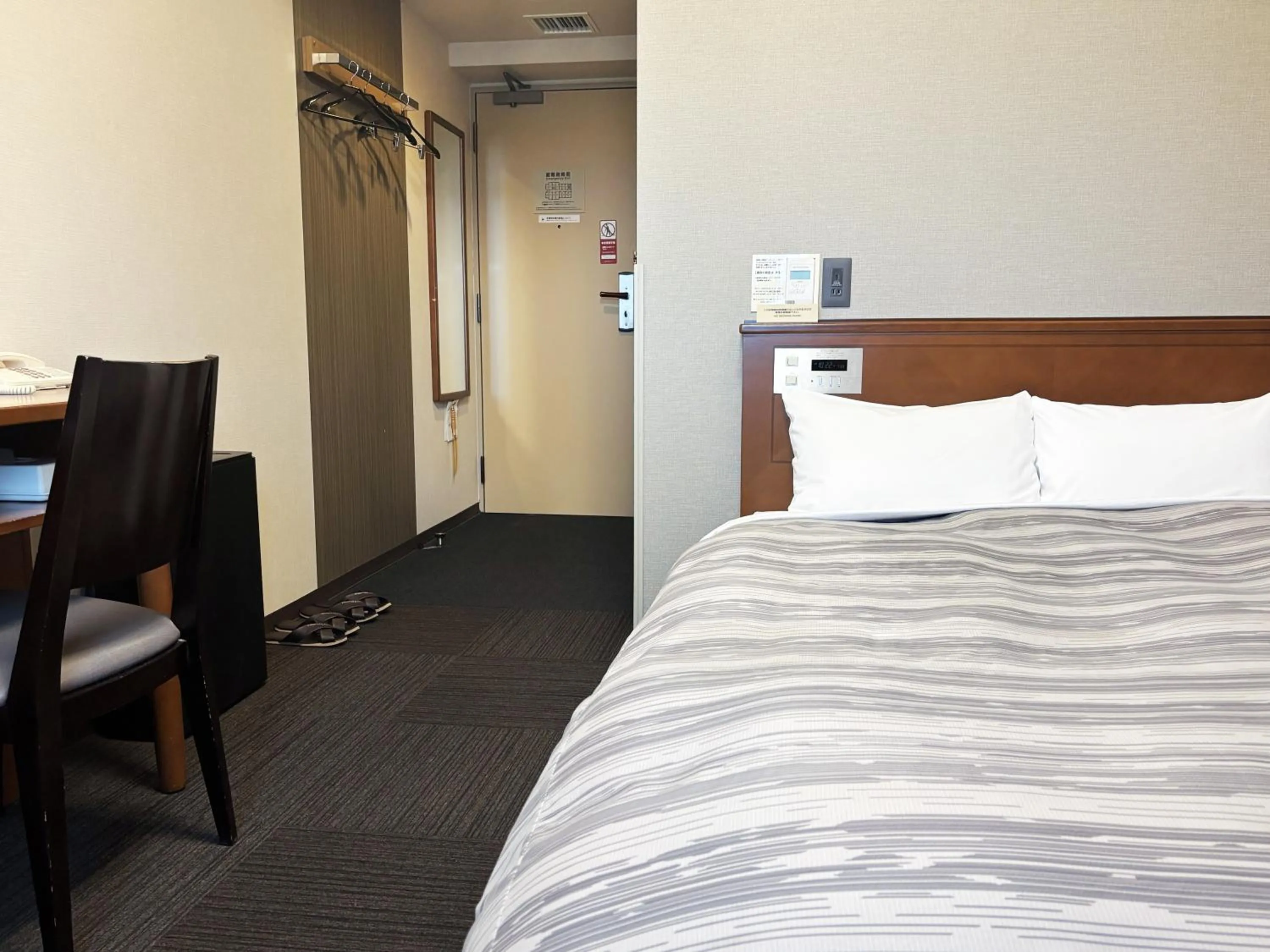 Photo of the whole room, Bed in Hotel Route-Inn Abashiri Ekimae