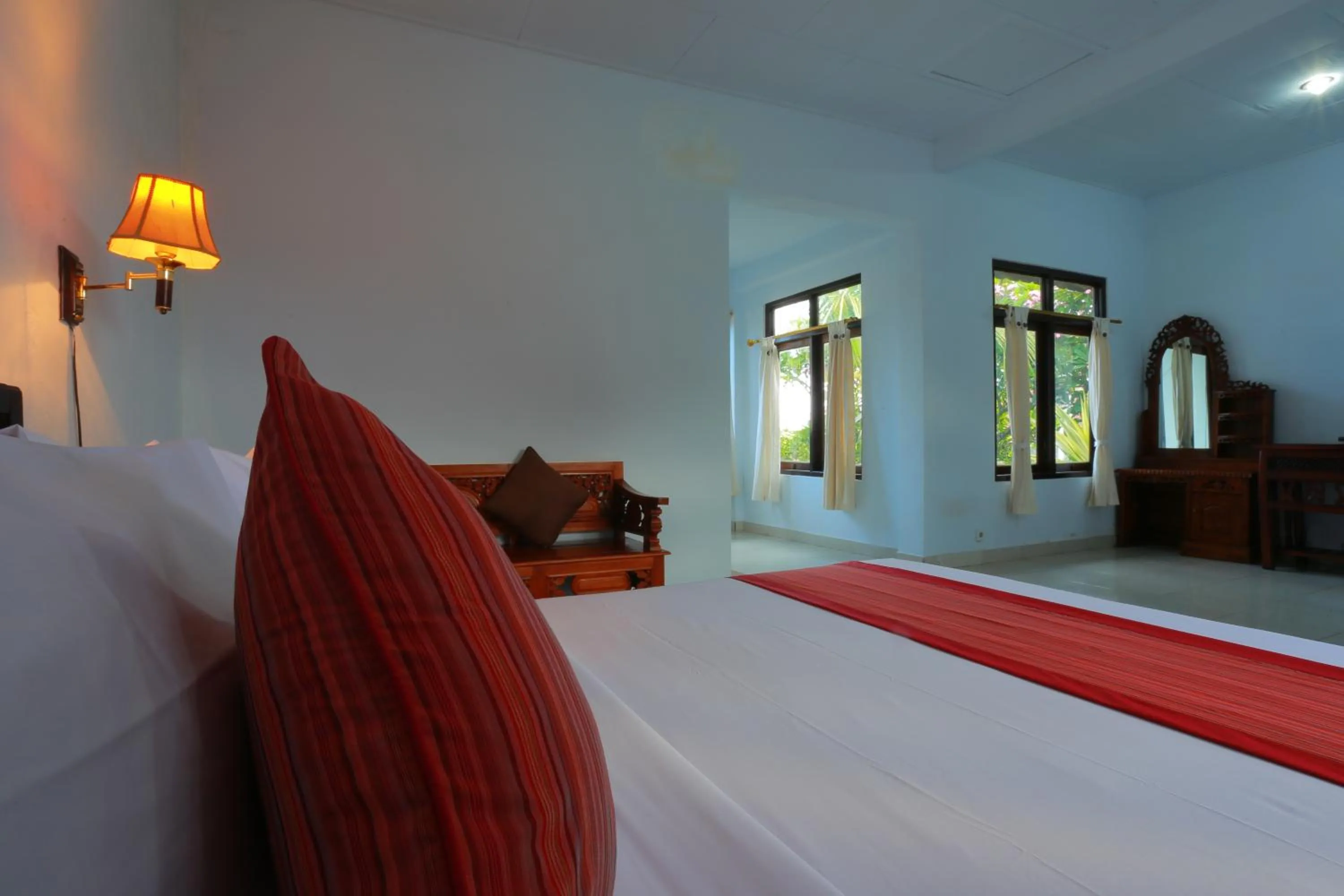 Bed in Warsa's Garden Bungalow and Spa