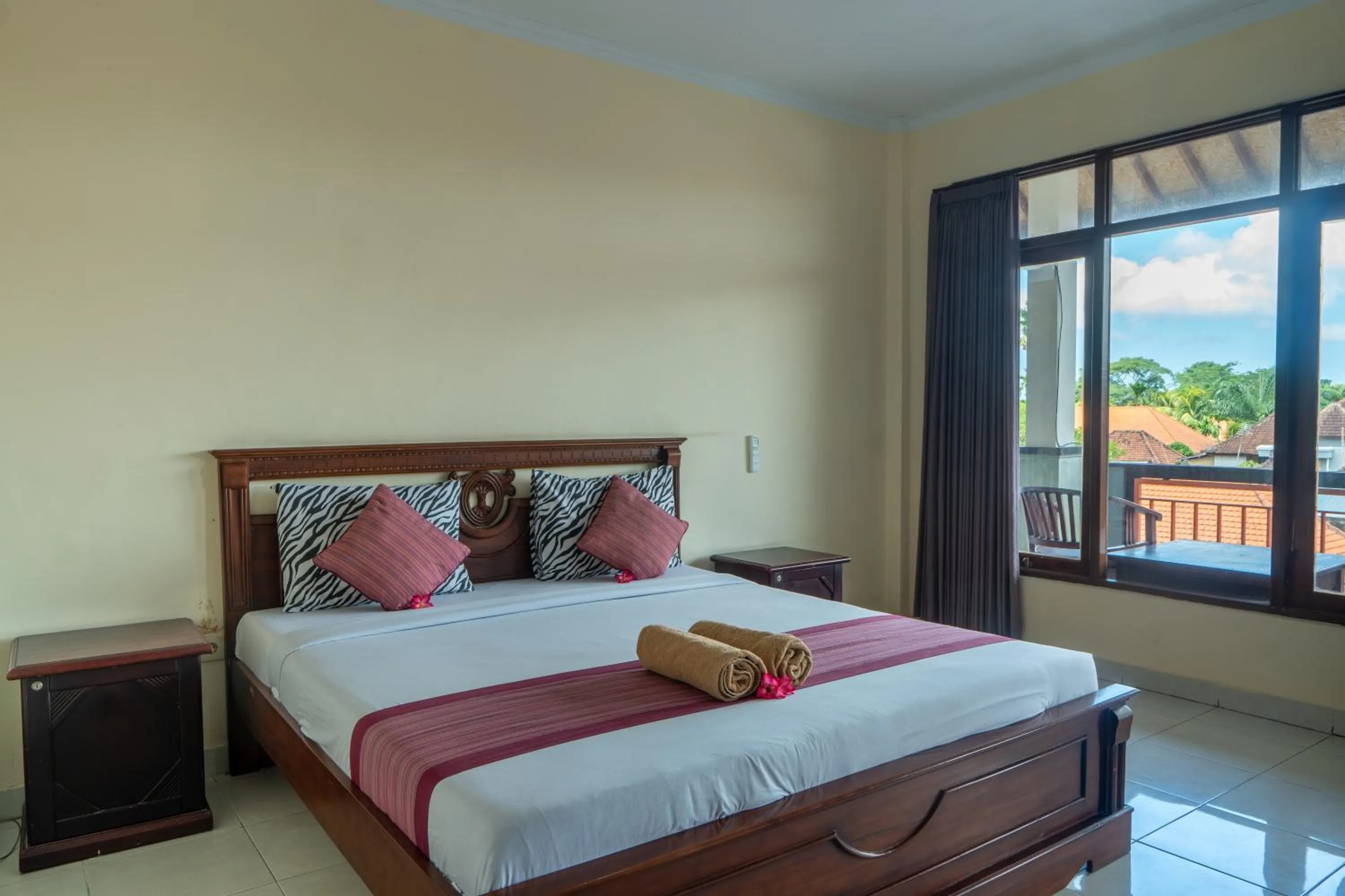 Bed in Warsa's Garden Bungalow and Spa