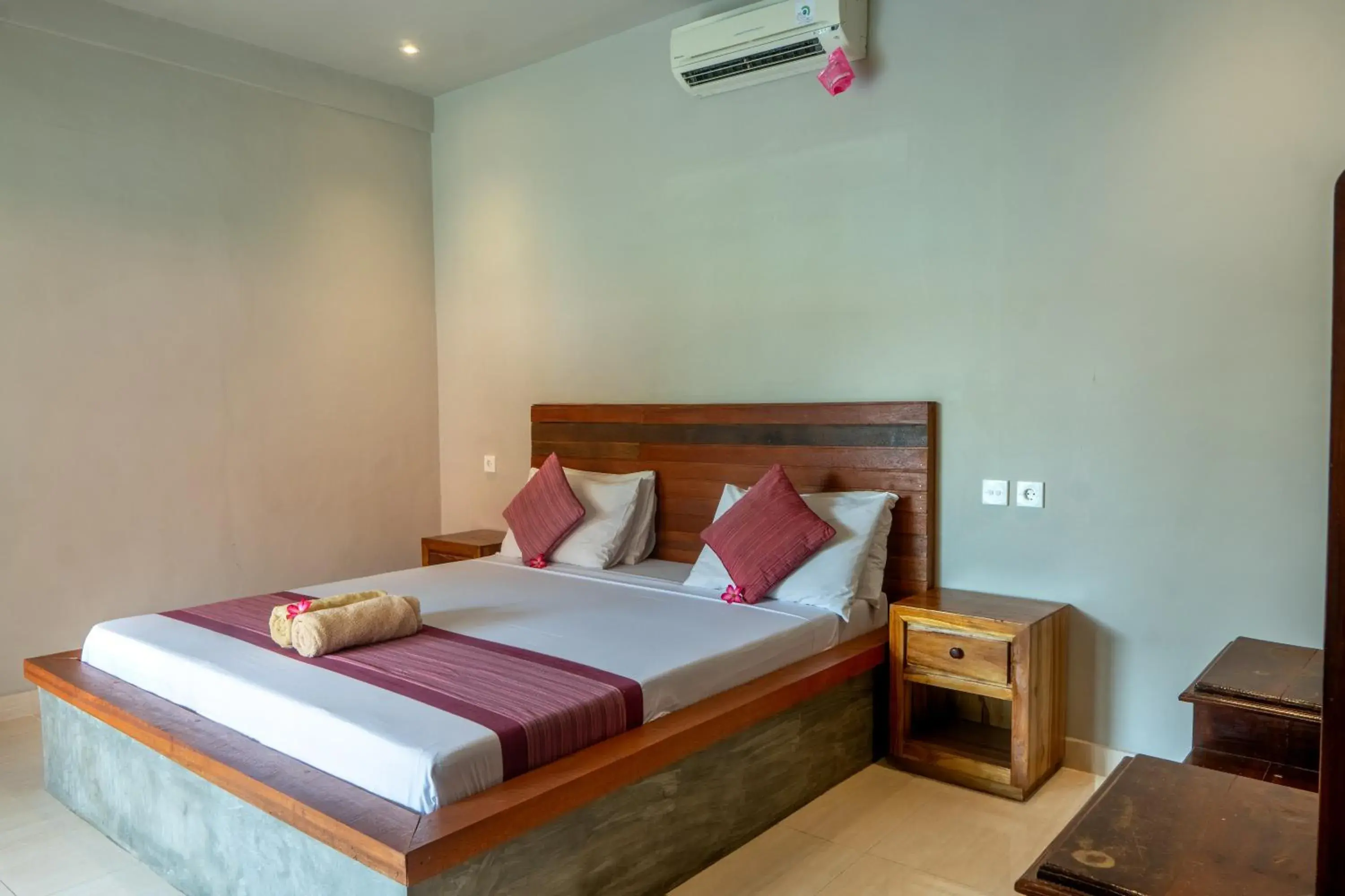 Bed in Warsa's Garden Bungalow and Spa Bed in Warsa's Garden Bungalow and Spa