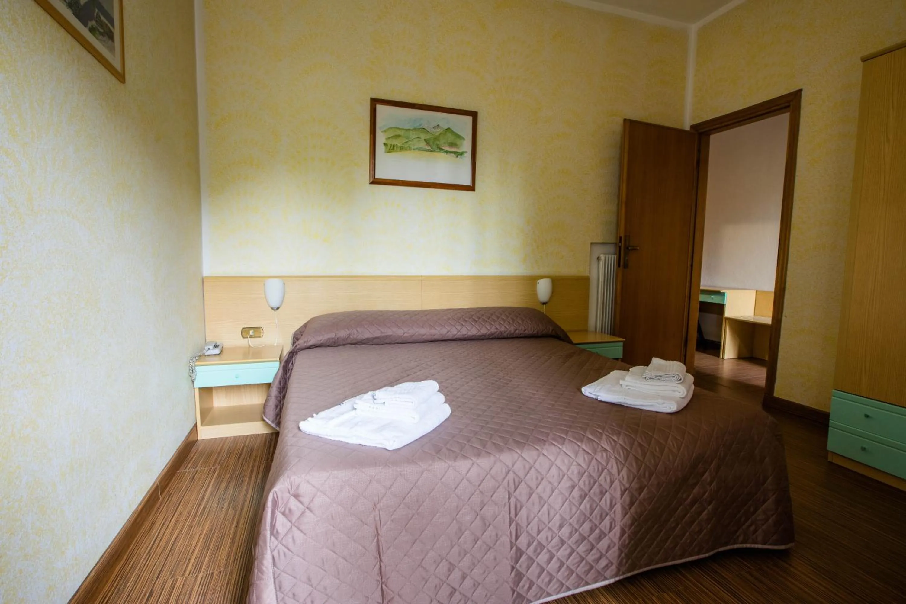 Bedroom in Hotel La Tavernetta dei Ronchi