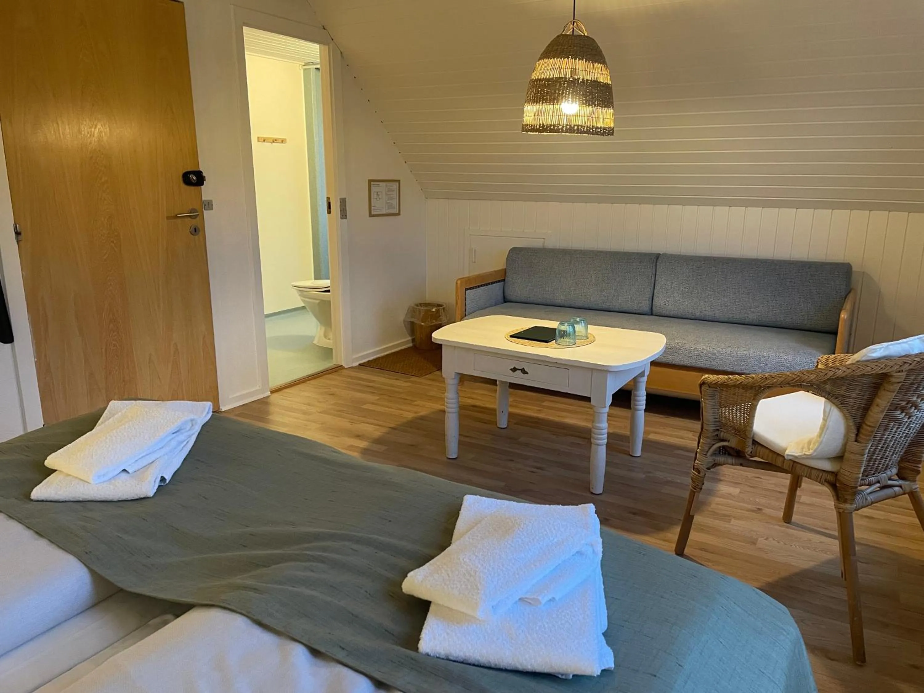 Living room, Bed in Hotel Kirkedal B&B