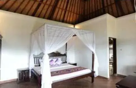 Bed in Cempaka Belimbing Villa Bed in Cempaka Belimbing Villa