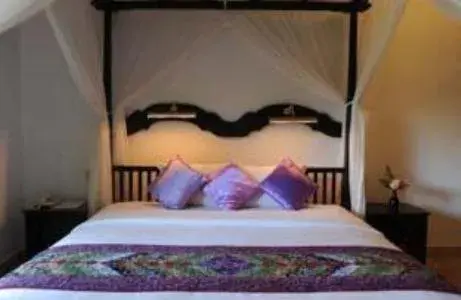 Bed in Cempaka Belimbing Villa Bed in Cempaka Belimbing Villa