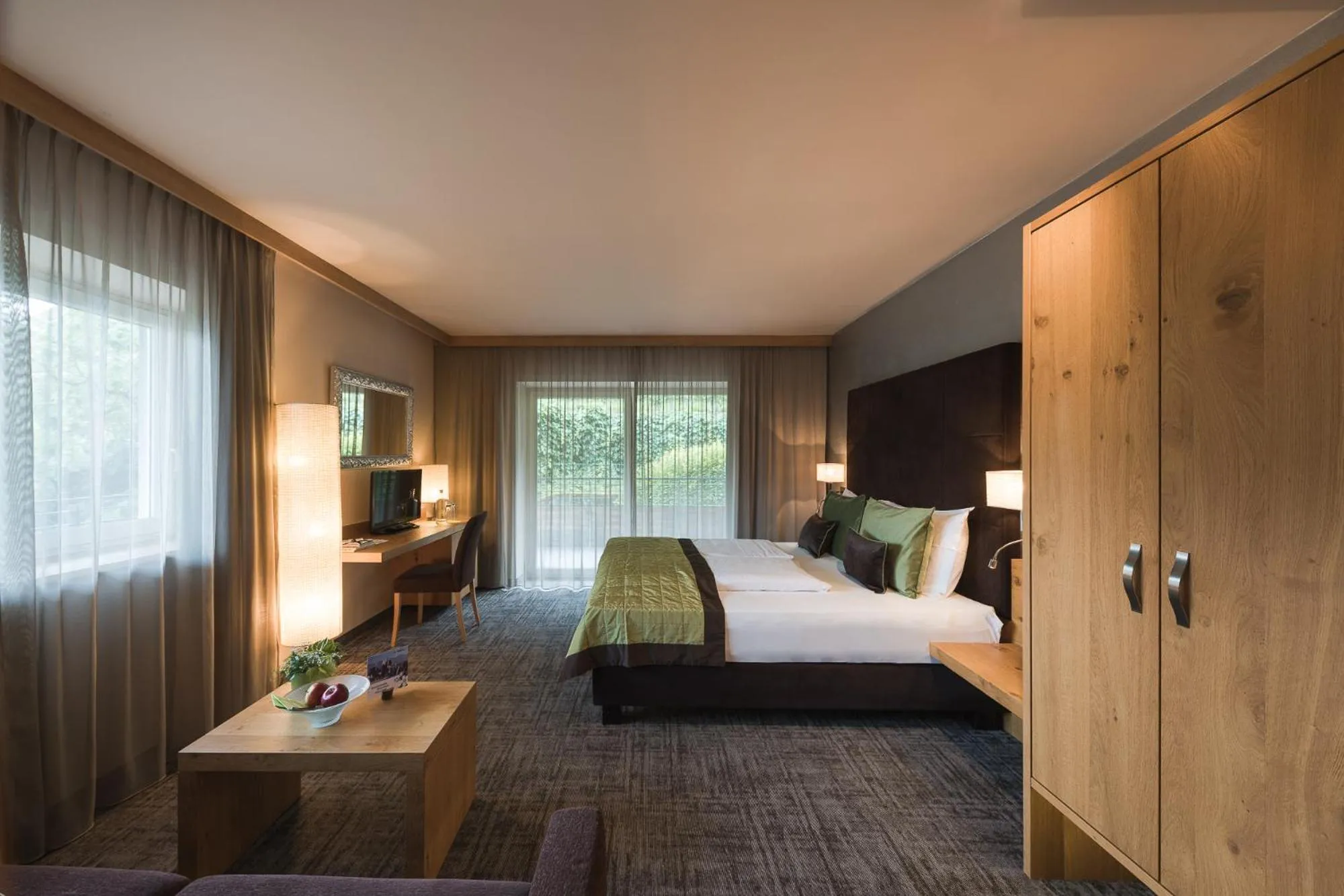 View (from property/room), Bed in La Maiena Meran Resort