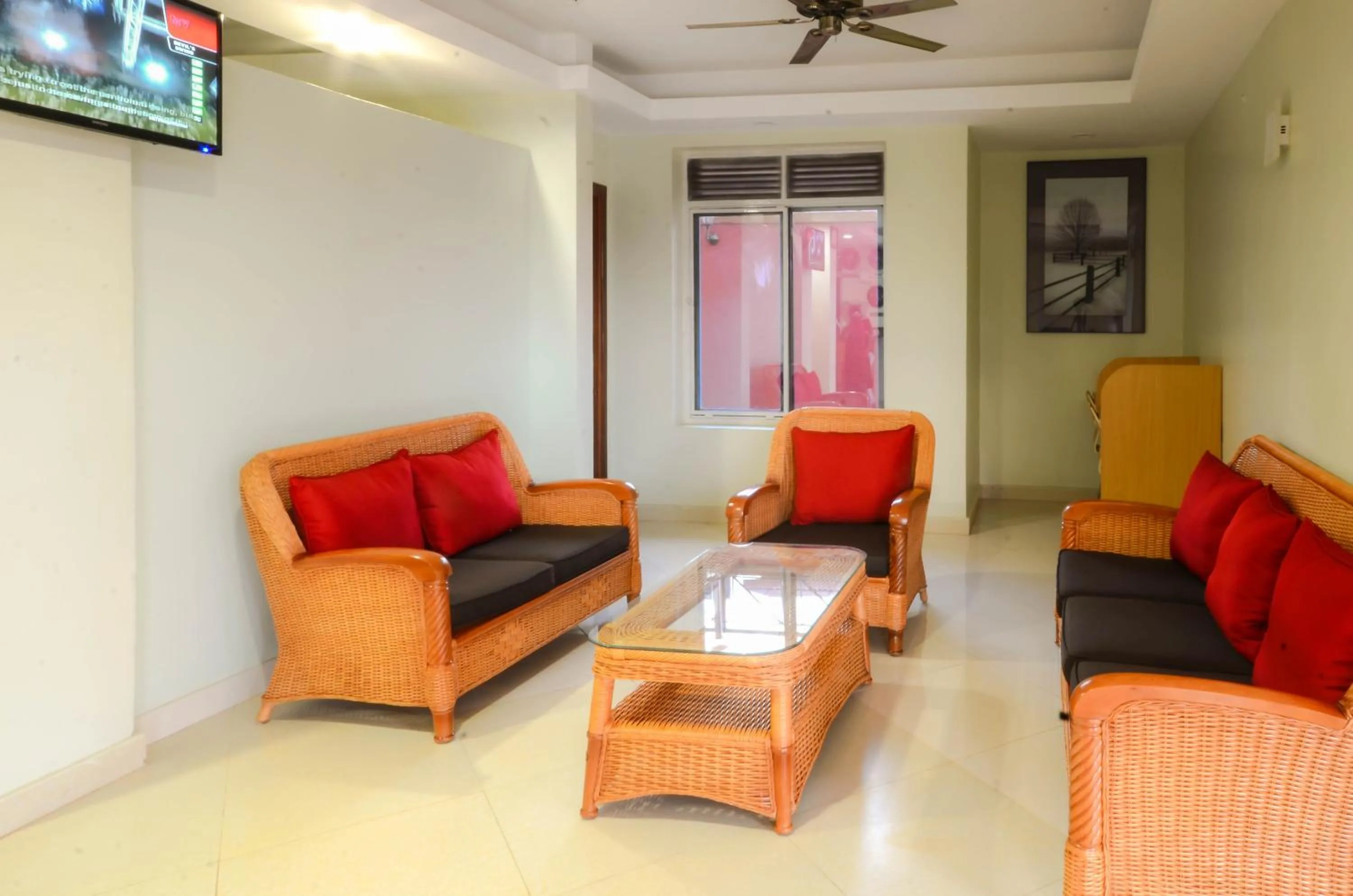 Communal lounge/ TV room in Nyumbani Hotel