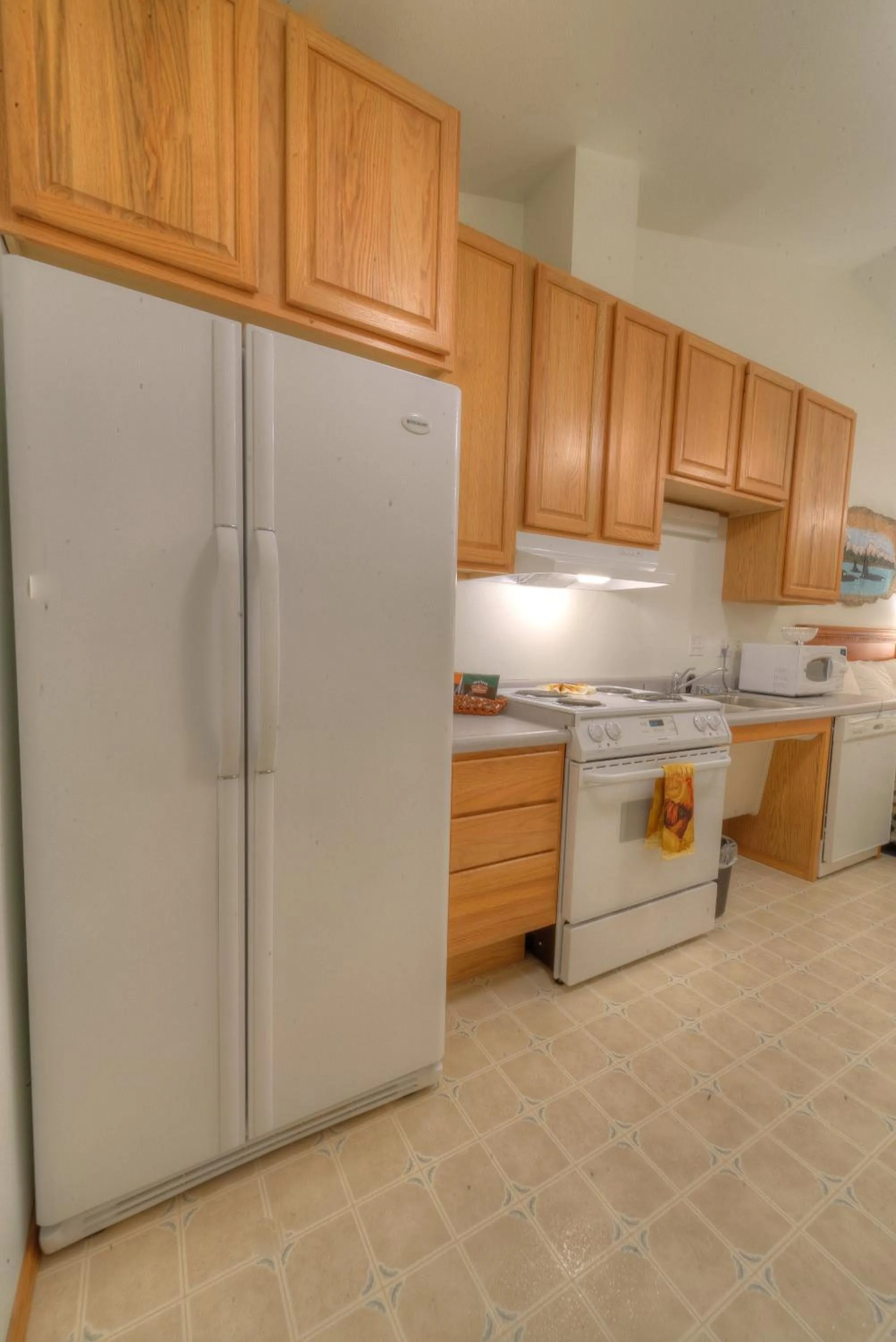 Kitchen or kitchenette in Frontier Suites Hotel in Juneau