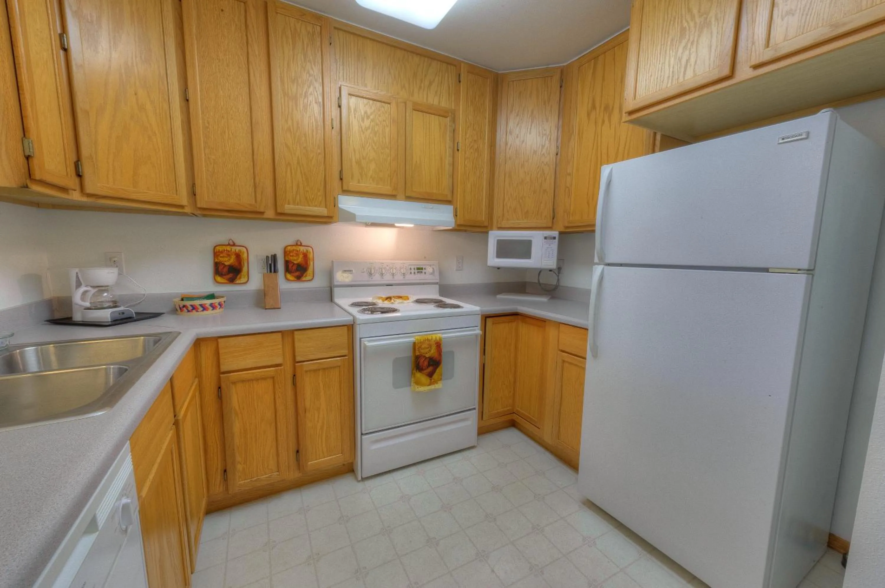 Kitchen or kitchenette in Frontier Suites Hotel in Juneau