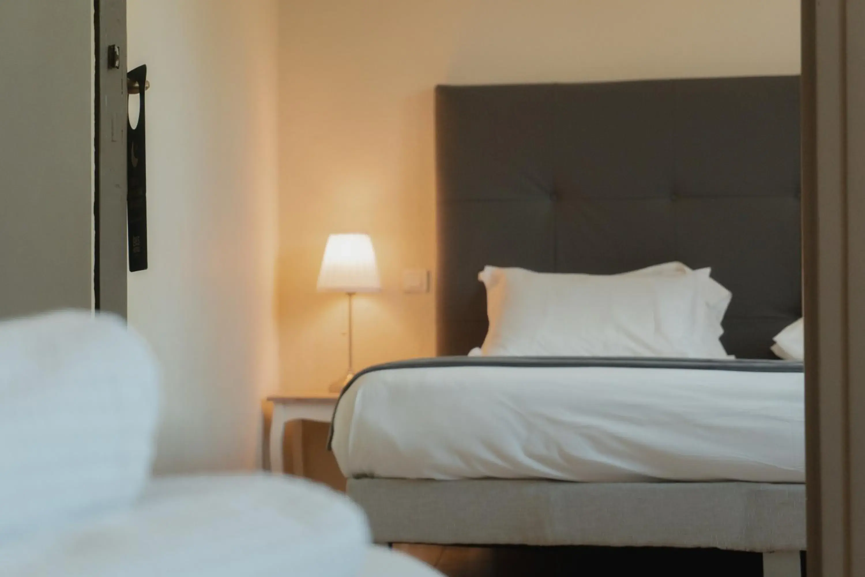 Bed in Hôtel Les Magnanarelles Bed in Hôtel Les Magnanarelles