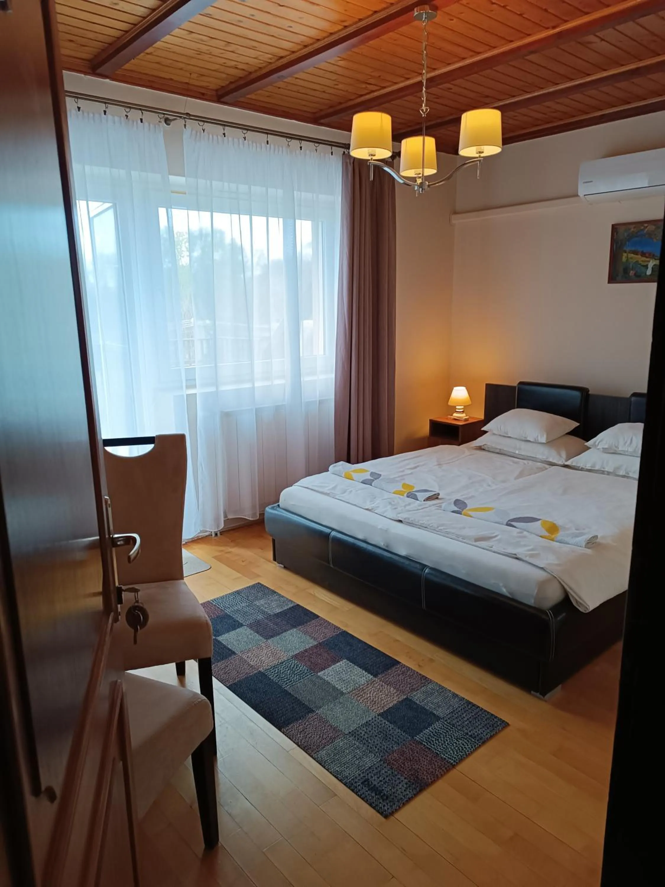 Bed in Szilvia Panzió Gyomaendrőd