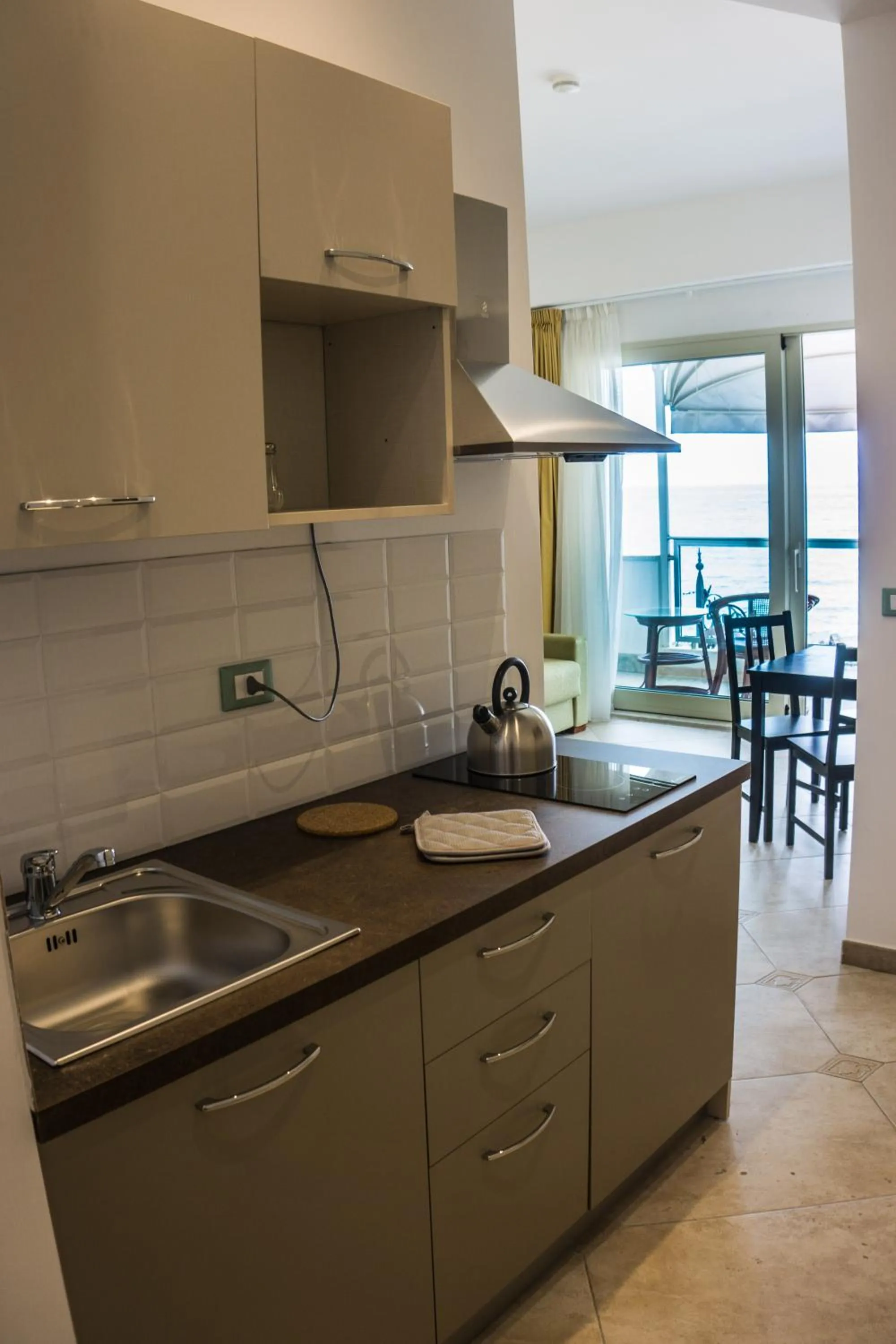 Kitchen or kitchenette in IG-Tysandros Apartments
