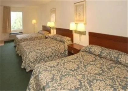 Bed in Country Hearth Inn & Suites Dawson