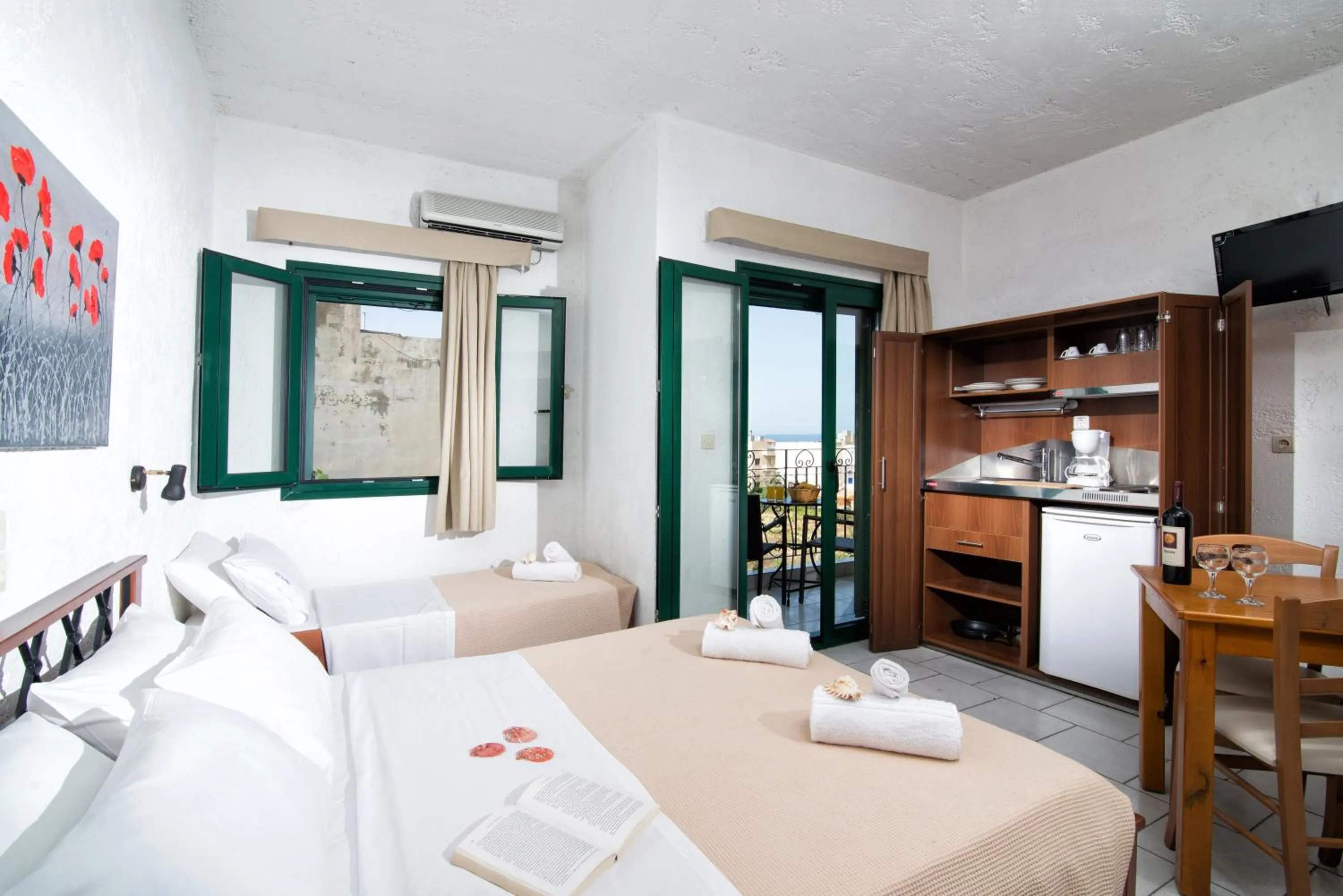 Dining area, Bed in Erofili Apartments