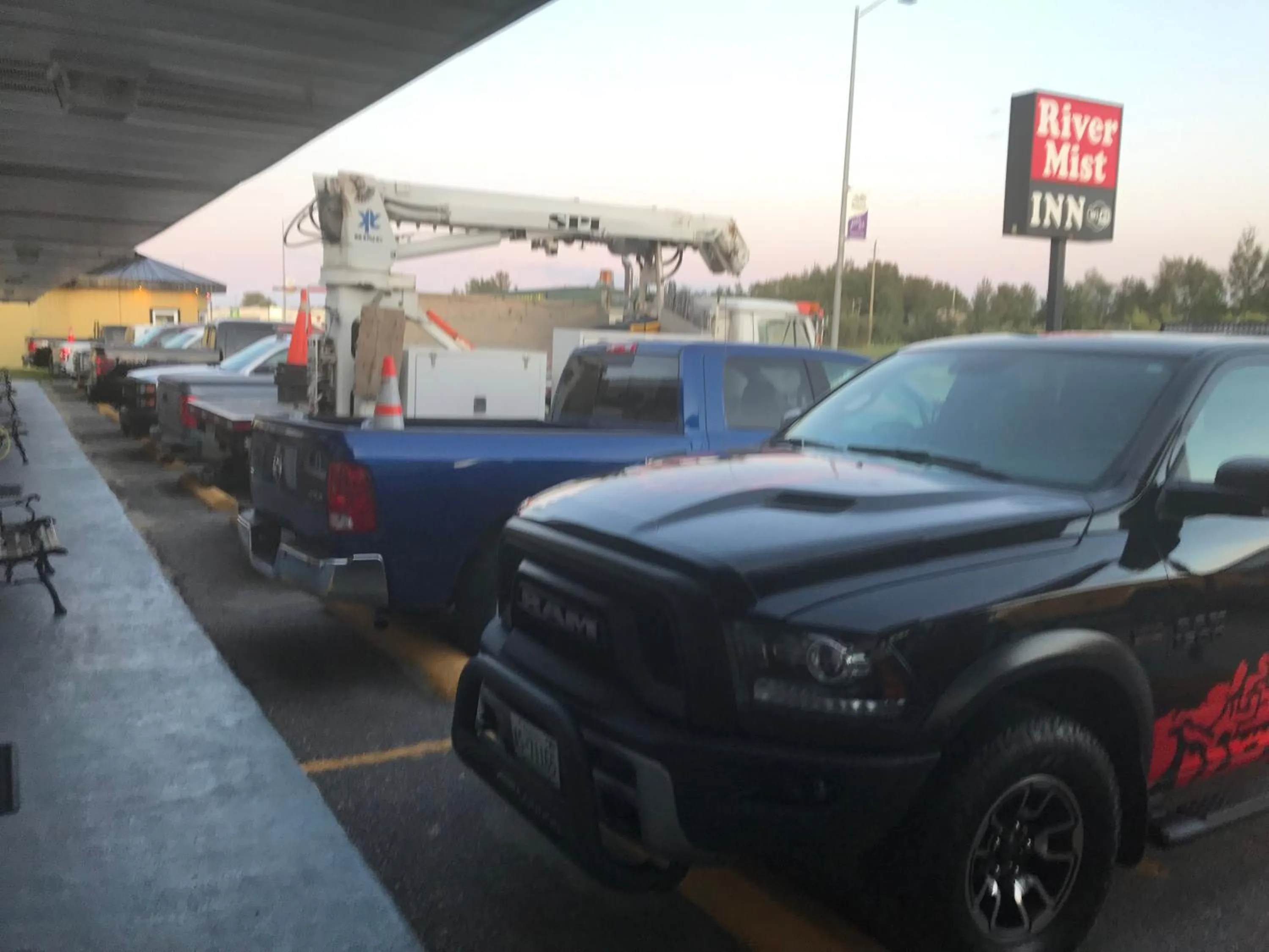 Property logo or sign in River Mist Inn