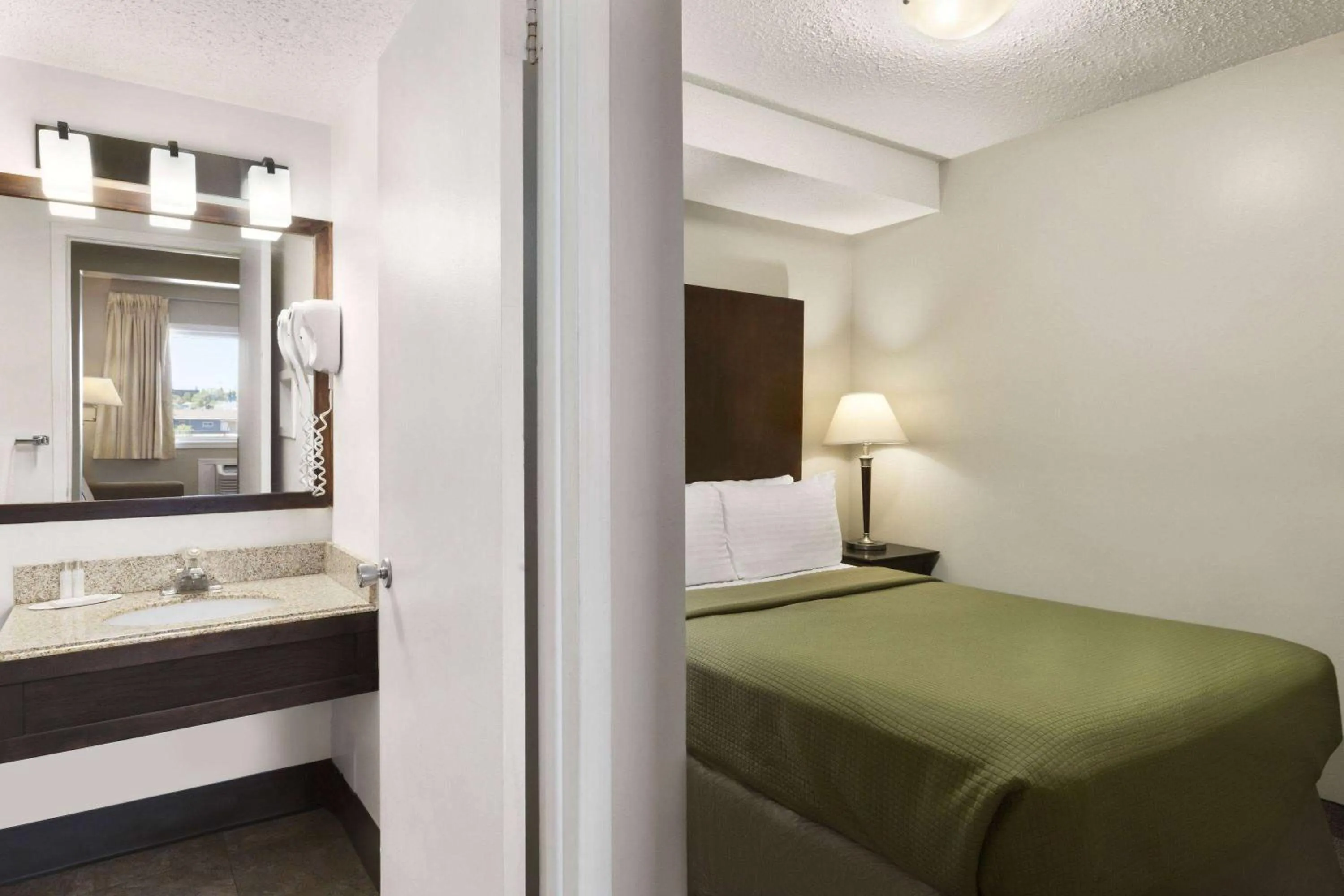 Bed in Thriftlodge Saskatoon