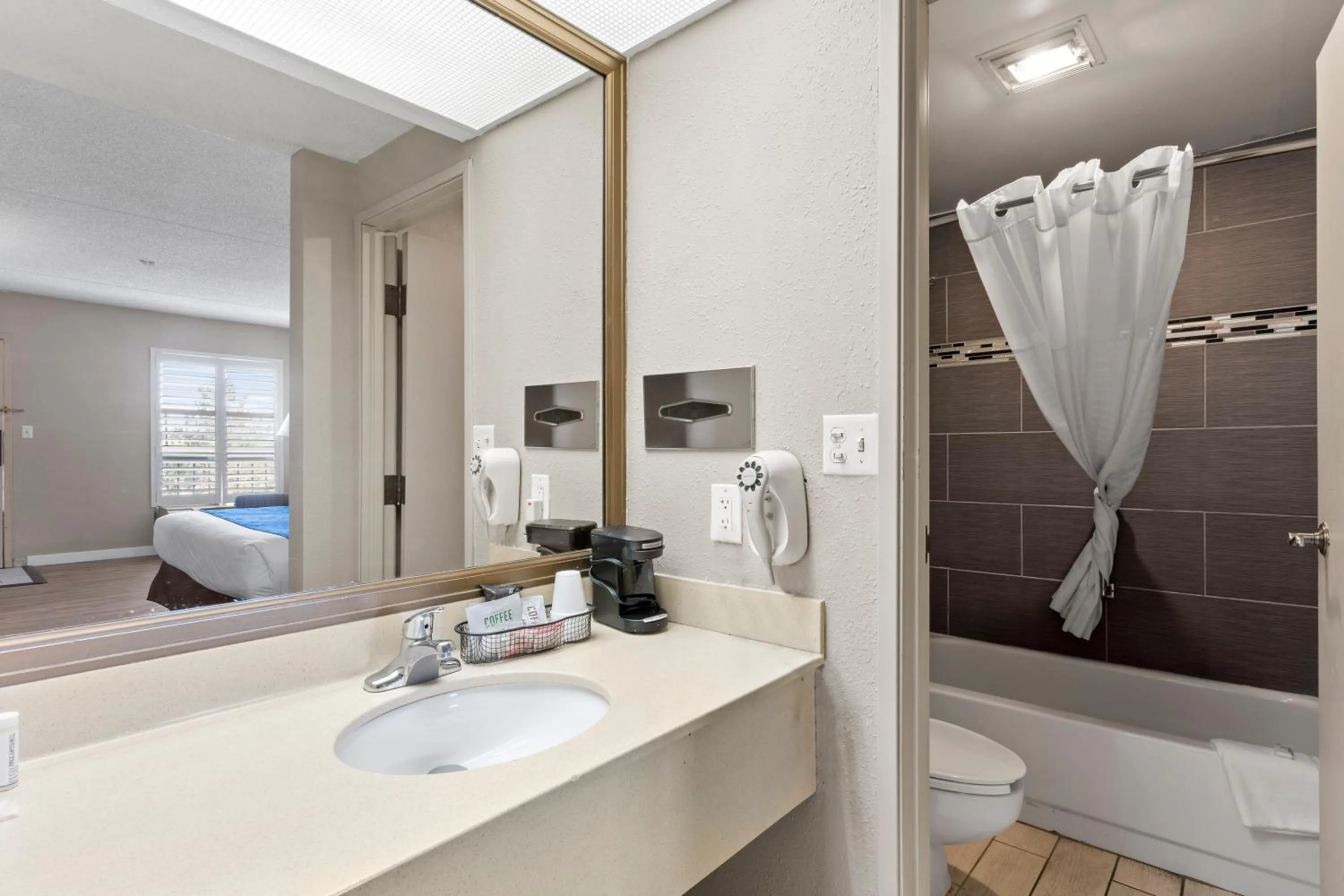 Bathroom in Travelodge by Wyndham Pueblo