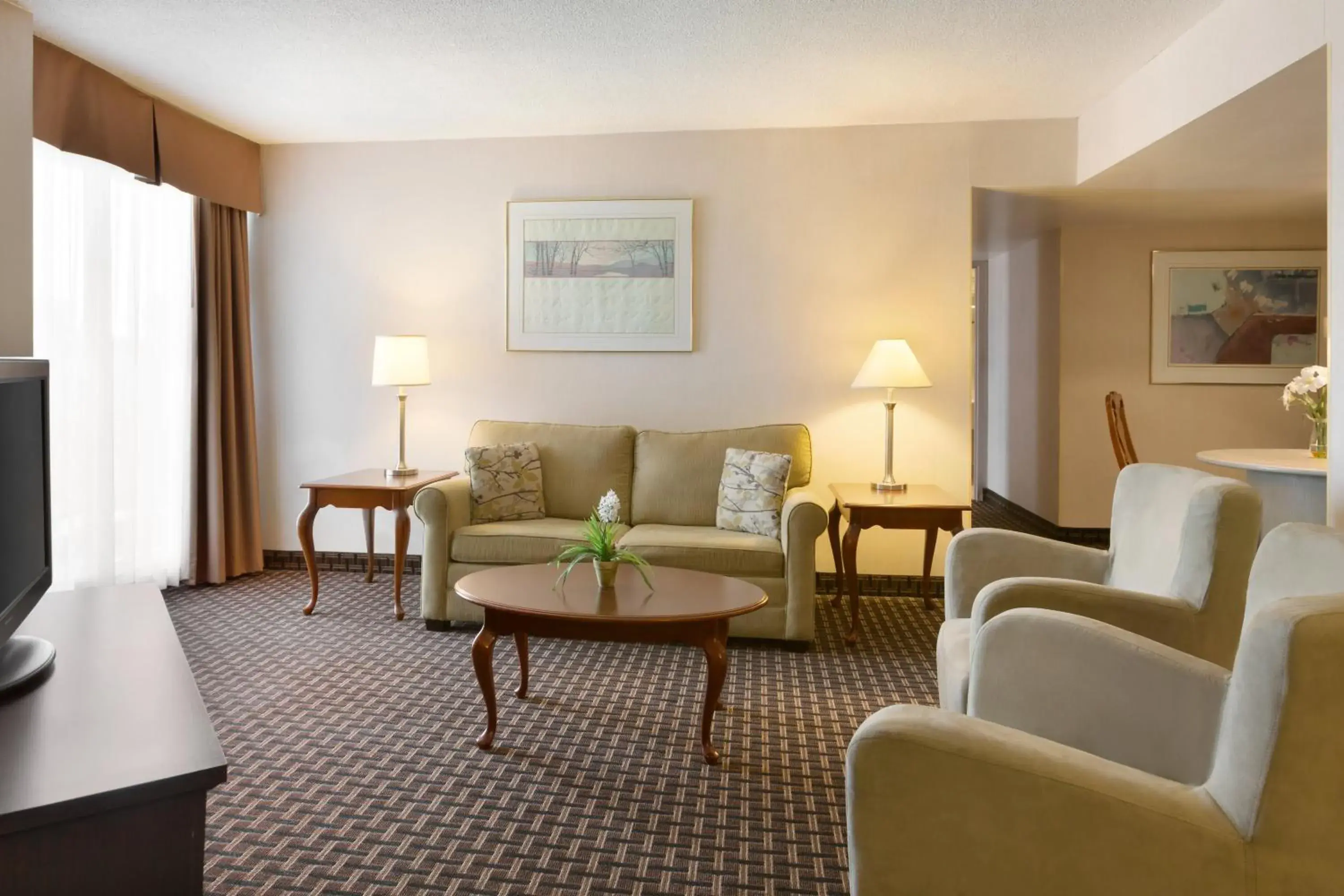 Living room in Ramada by Wyndham Belleville Harbourview Conference Center Living room in Ramada by Wyndham Belleville Harbourview Conference Center