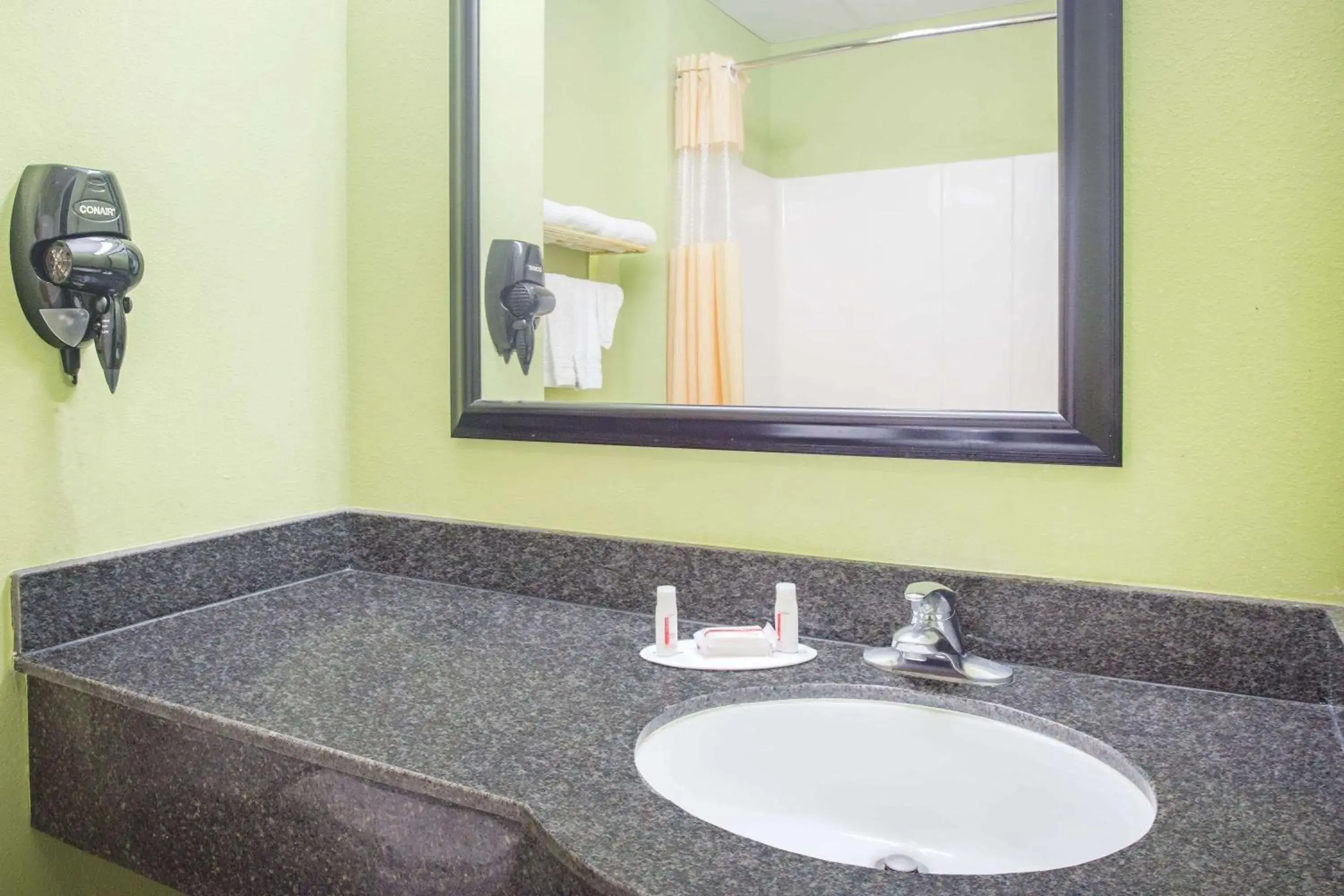 Bathroom in Days Inn & Suites by Wyndham Swainsboro Bathroom in Days Inn & Suites by Wyndham Swainsboro