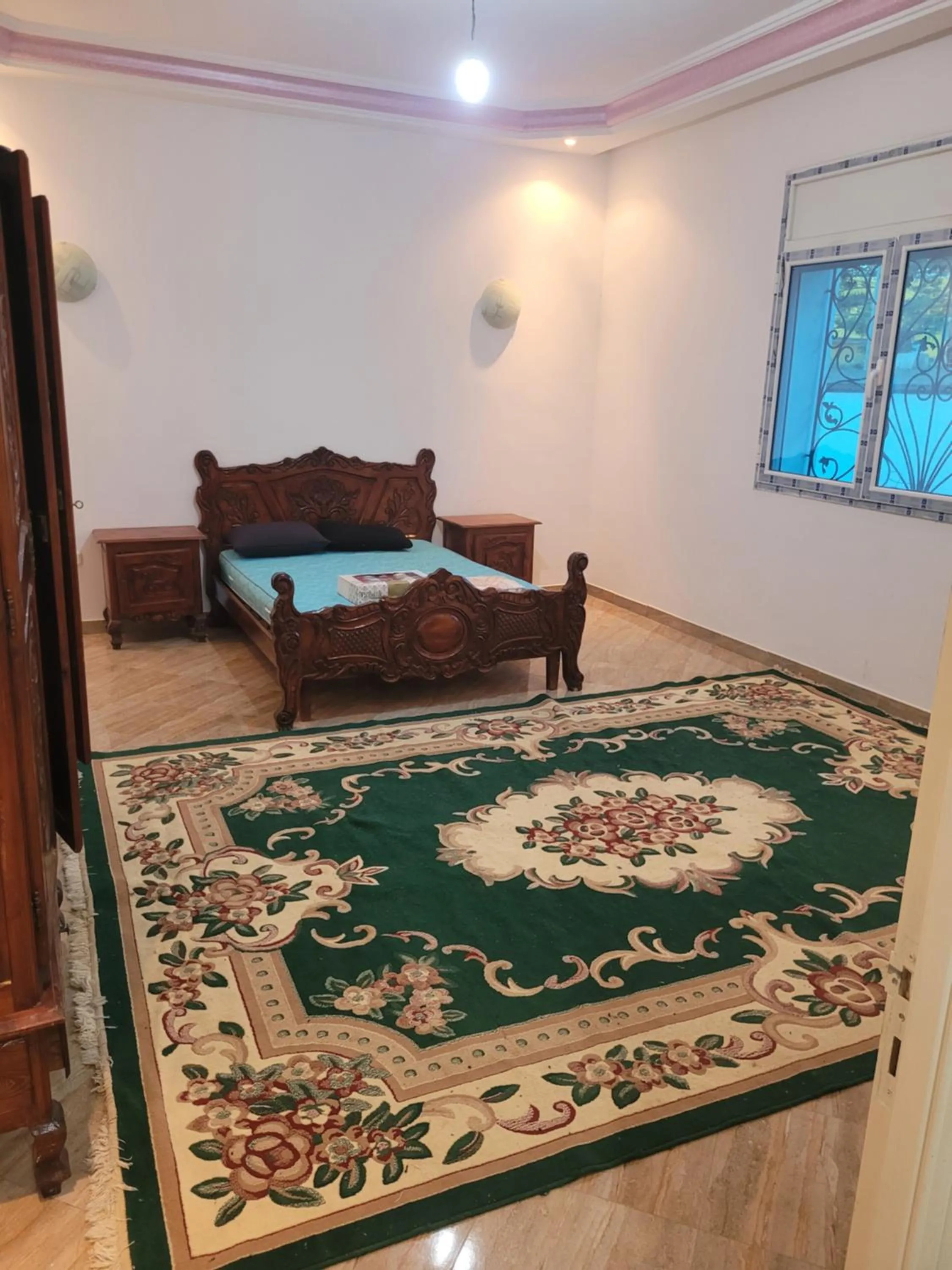Bed in Miriam Apartments